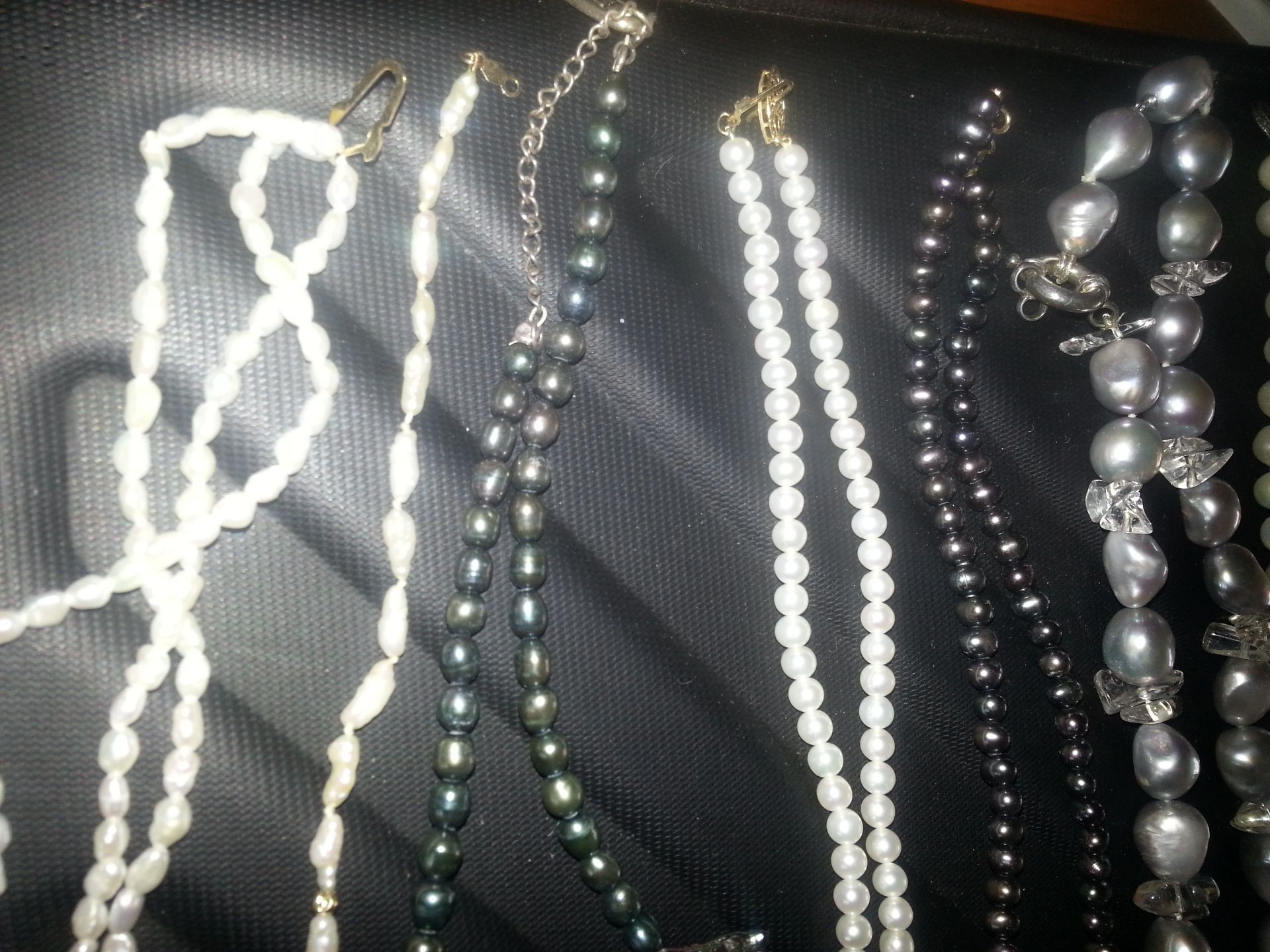 A collection of pearls necklaces and bracelet with 9ct, 14ct and silver etc, clasps - Image 3 of 4