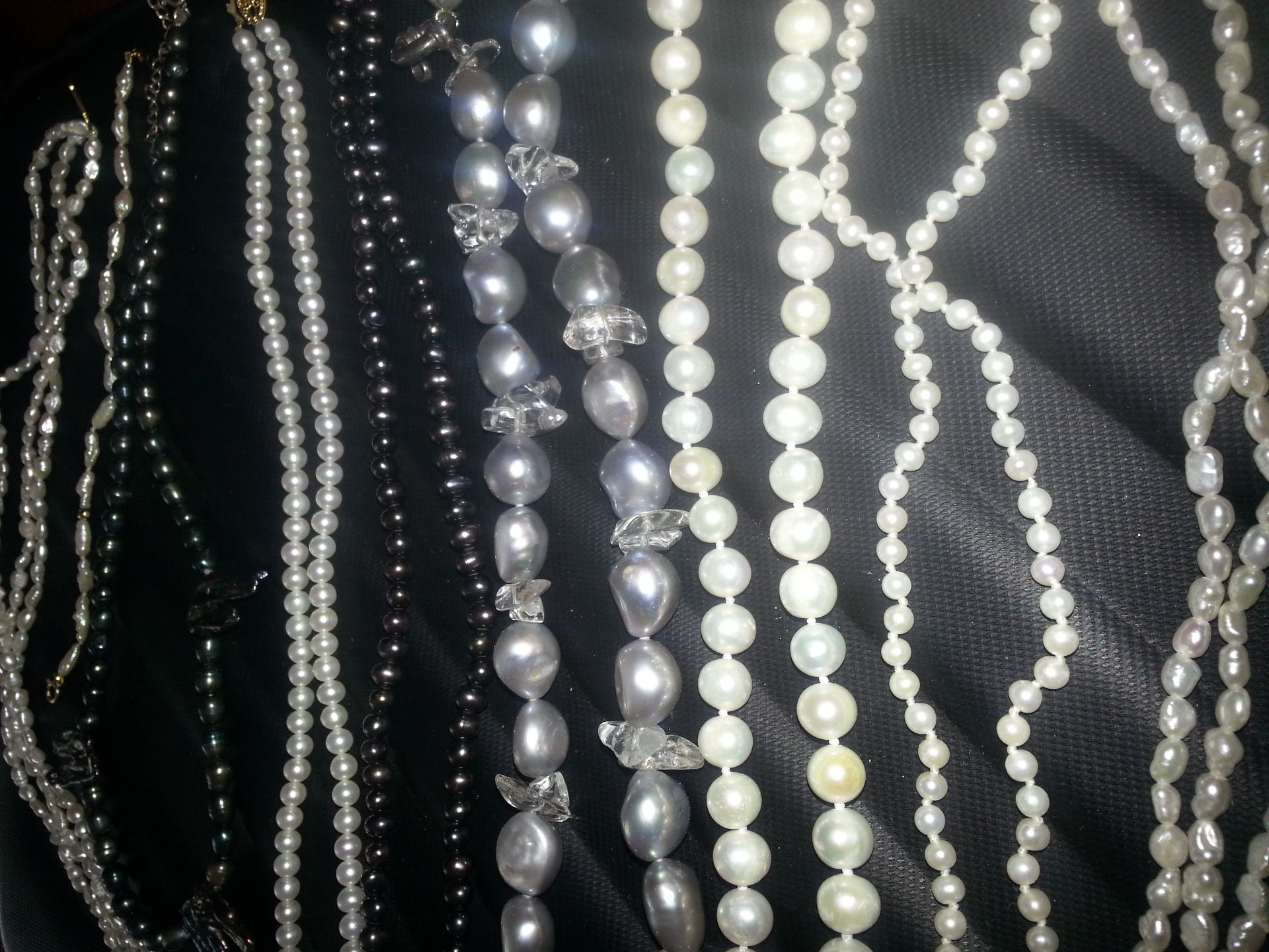 A collection of pearls necklaces and bracelet with 9ct, 14ct and silver etc, clasps - Image 4 of 4