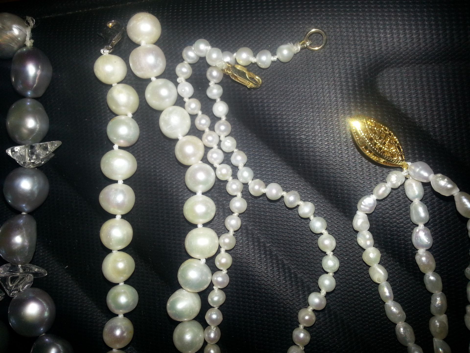 A collection of pearls necklaces and bracelet with 9ct, 14ct and silver etc, clasps - Image 2 of 4