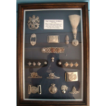 A Large Frame Of 'Volunteer Artillery' Badges And Insignia 1859-1908.