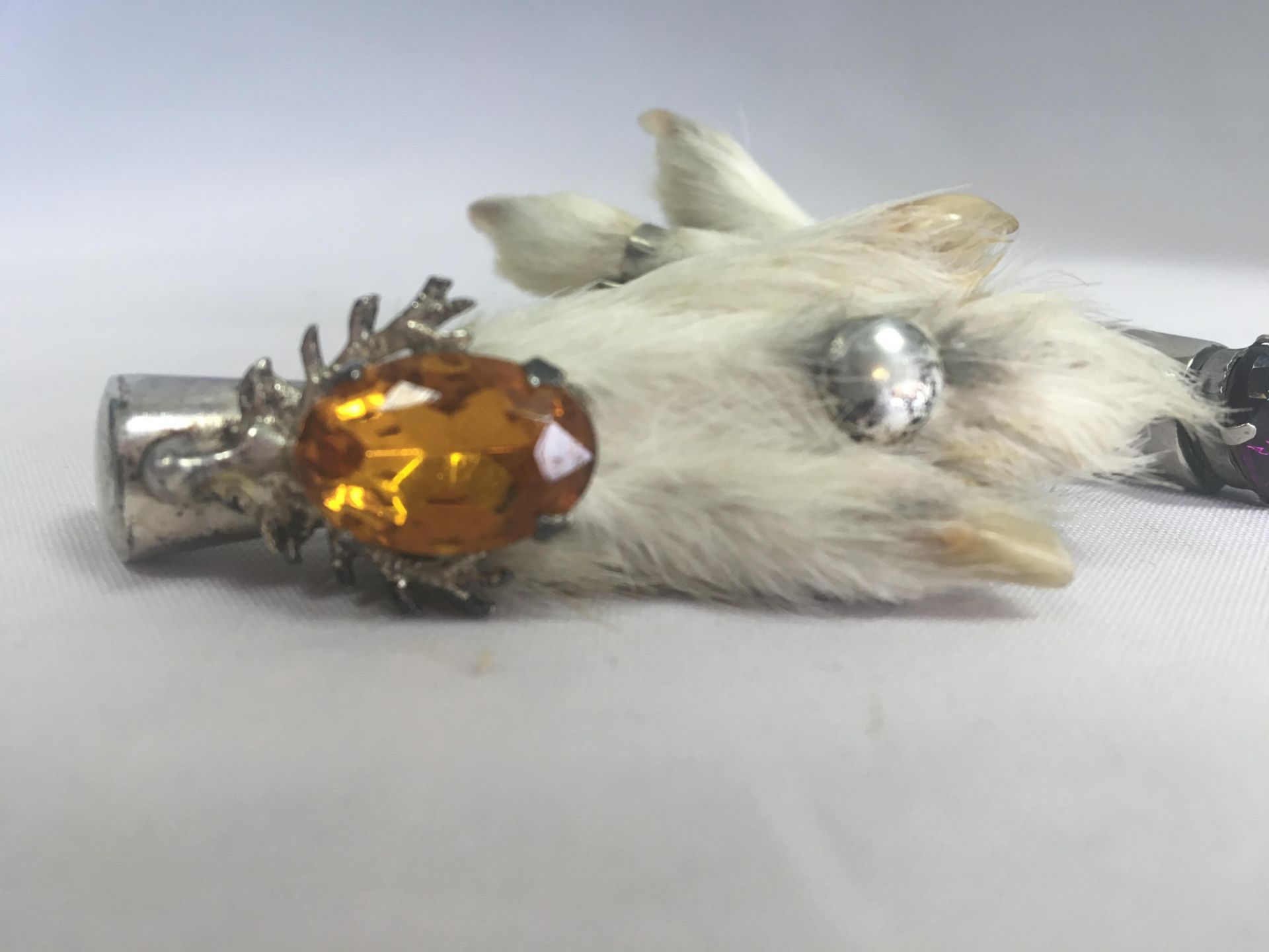 TWO VINTAGE SCOTTISH GROUSE FOOT BROOCHES OR KILT PINS. ONE WITH AMBER COLOURED STONE, STAGS HEAD, - Image 2 of 3