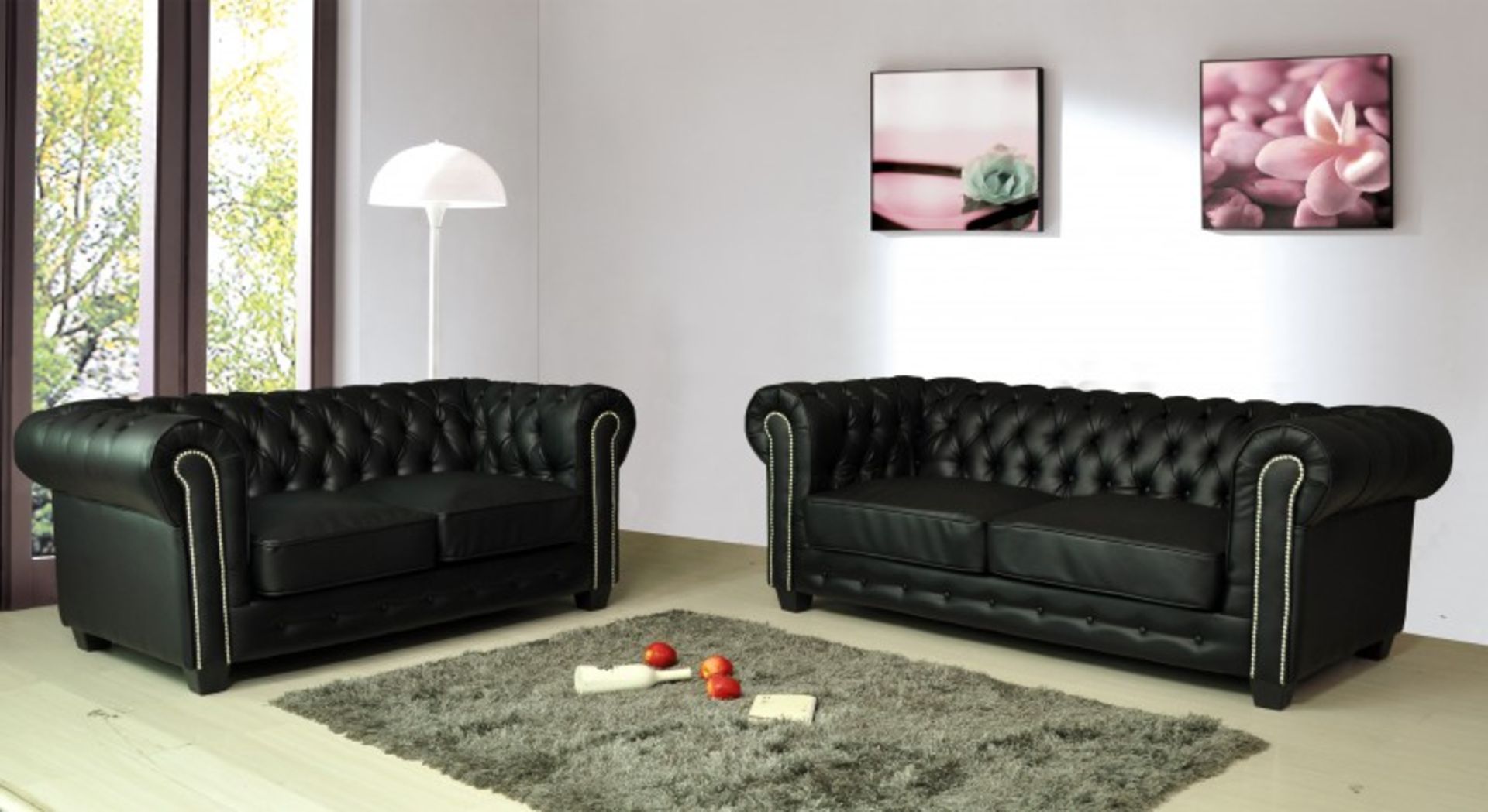 Brand new boxed direct from the manufacturers 3 seater and 2 seater black Chesterfield leather sofas