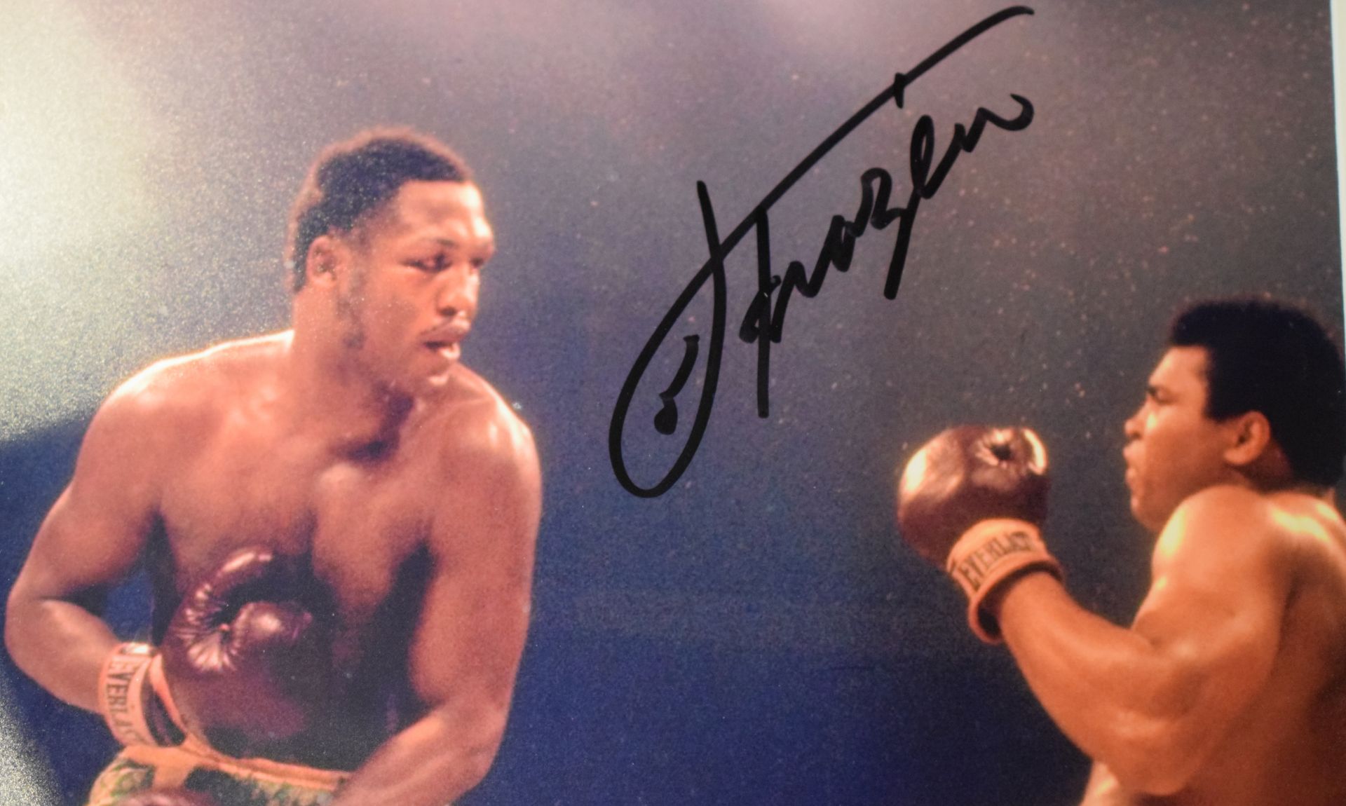 Excellent Signed Photograph of Joe Frazier knocking down Ali in 'The Fight Of The Century' - Image 2 of 5
