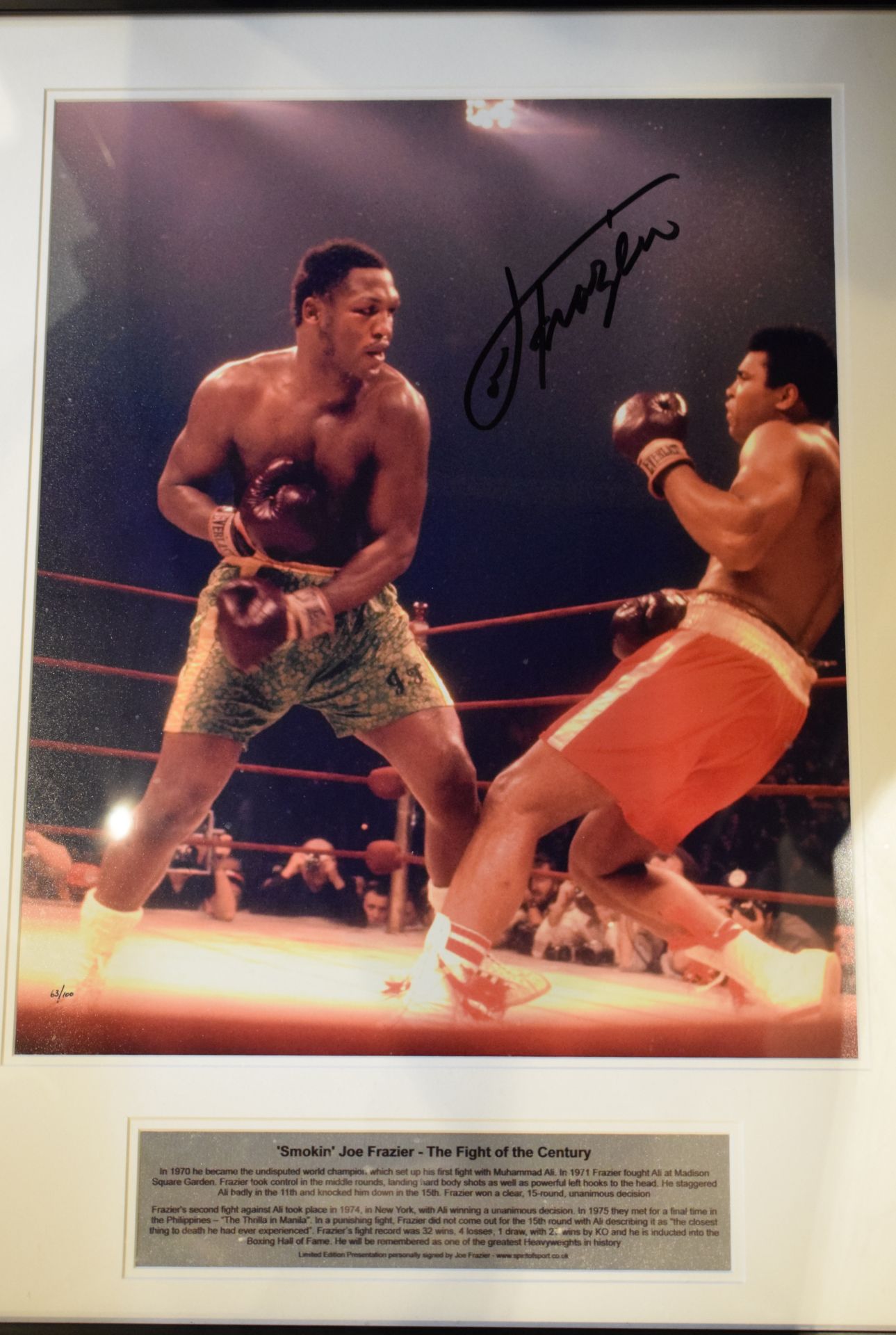 Excellent Signed Photograph of Joe Frazier knocking down Ali in 'The Fight Of The Century'
