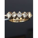 Pre-owned: 9ct yellow ring. Comprising of 5x4mm round diamonds