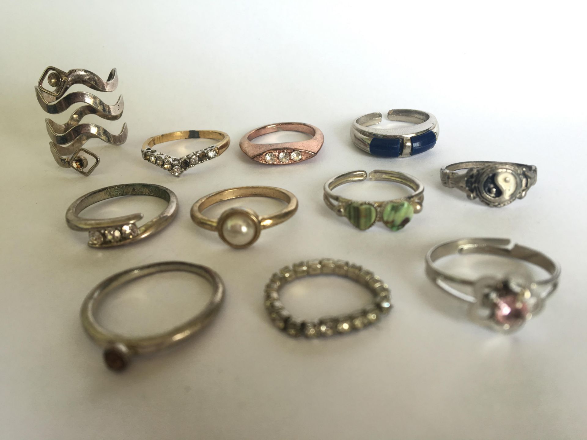 A GROUP OF DRESS RINGS (11). FREE UK DELIVERY.