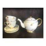 A VINTAGE SUTHERLAND CHINA HAND PAINTED TEA SET. Offered with FREE UK courier delivery,