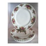 A GROUP OF SEVEN ROYAL ALBERT OLD COUNTRY ROSES DINNER PLATES, 26cm. Offered with free UK courier