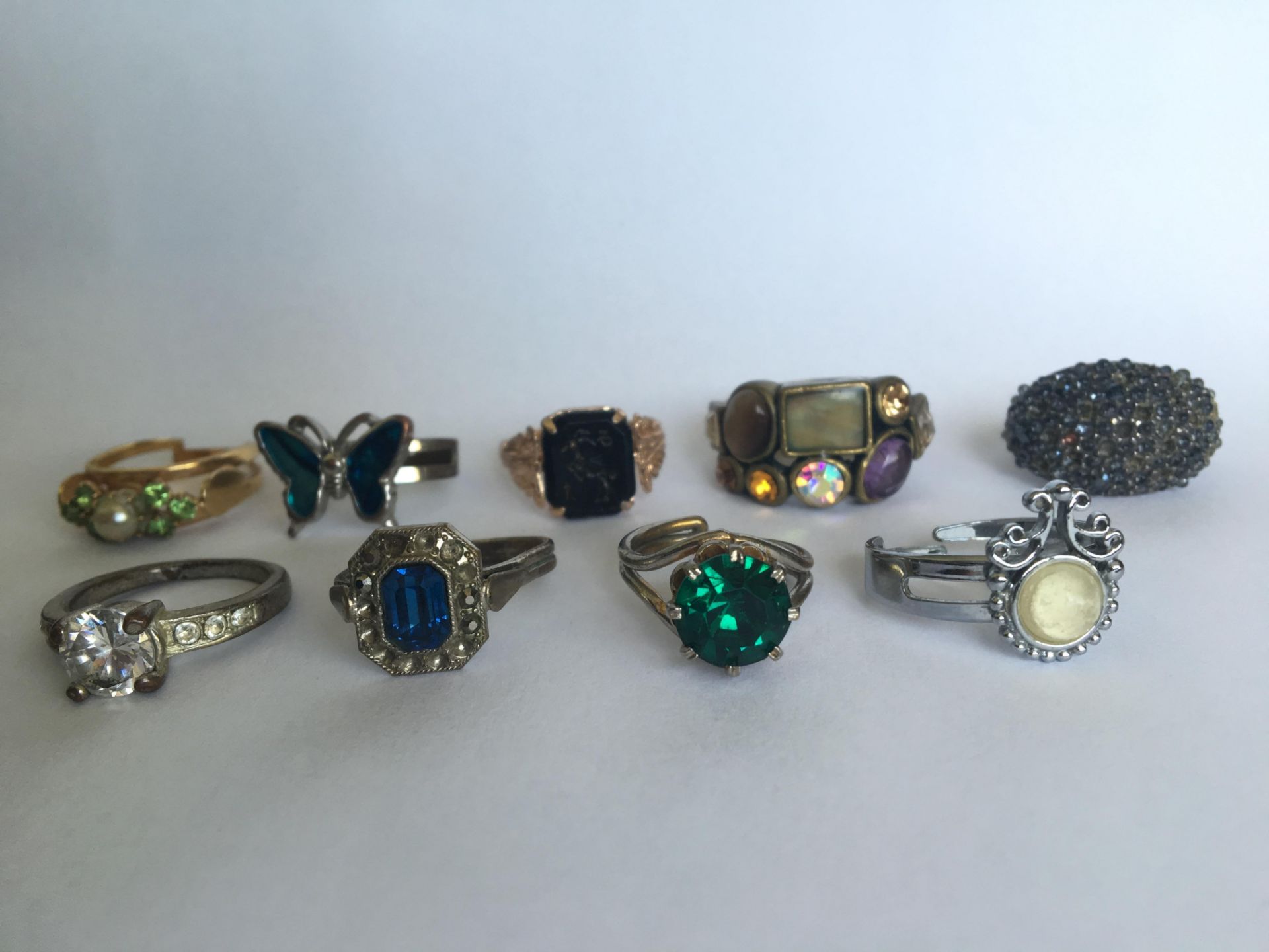 A GROUP OF COCKTAIL RINGS (9). FREE UK DELIVERY.