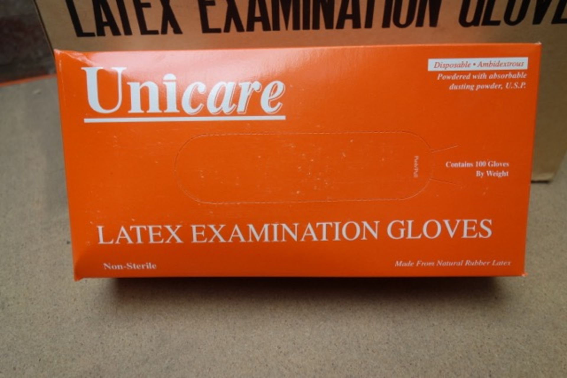 100 boxes of 100 Unicare Latex Powdered Examination Gloves - Non-Sterile - Size: Extra Small - Total