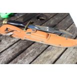 Bowie Crocodile Hunting Knife. Blade length 20cm. New with leather scabbard. Fine wooden handle with