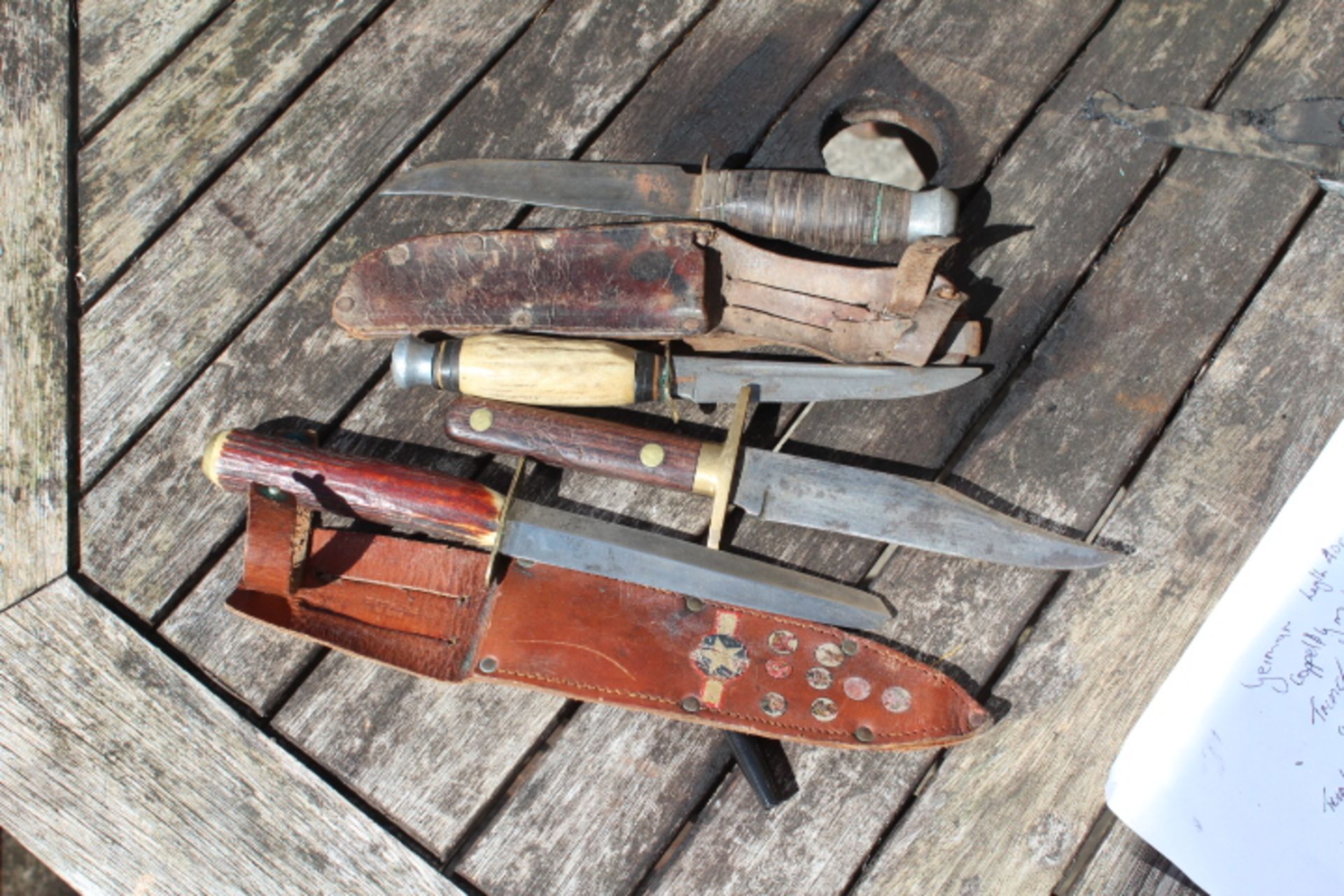 Early Scout and other knives. 4 in total. 2 have scabbards. 2 antler handles, 1 wood and one bound