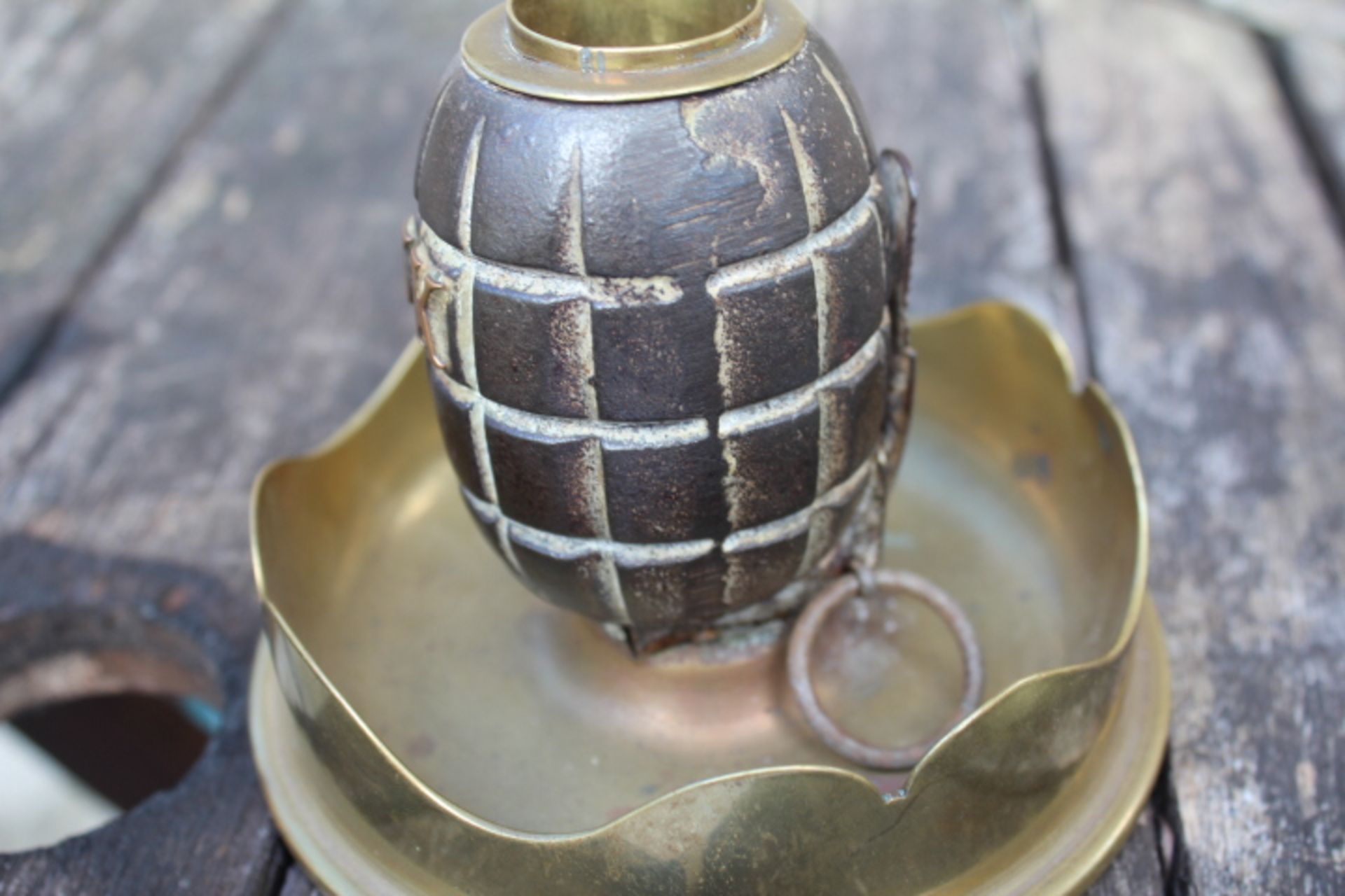 British military trench art. WW1/WW2 Mills Grenade mounted on a 45 Howser mark 2. The grenade has