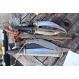 4 Middle Eastten and Asian Daggers. All come with scabbard. Buyer must be 18+.