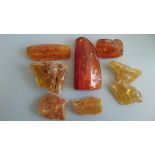 Raw amber with inclusions 215 grams