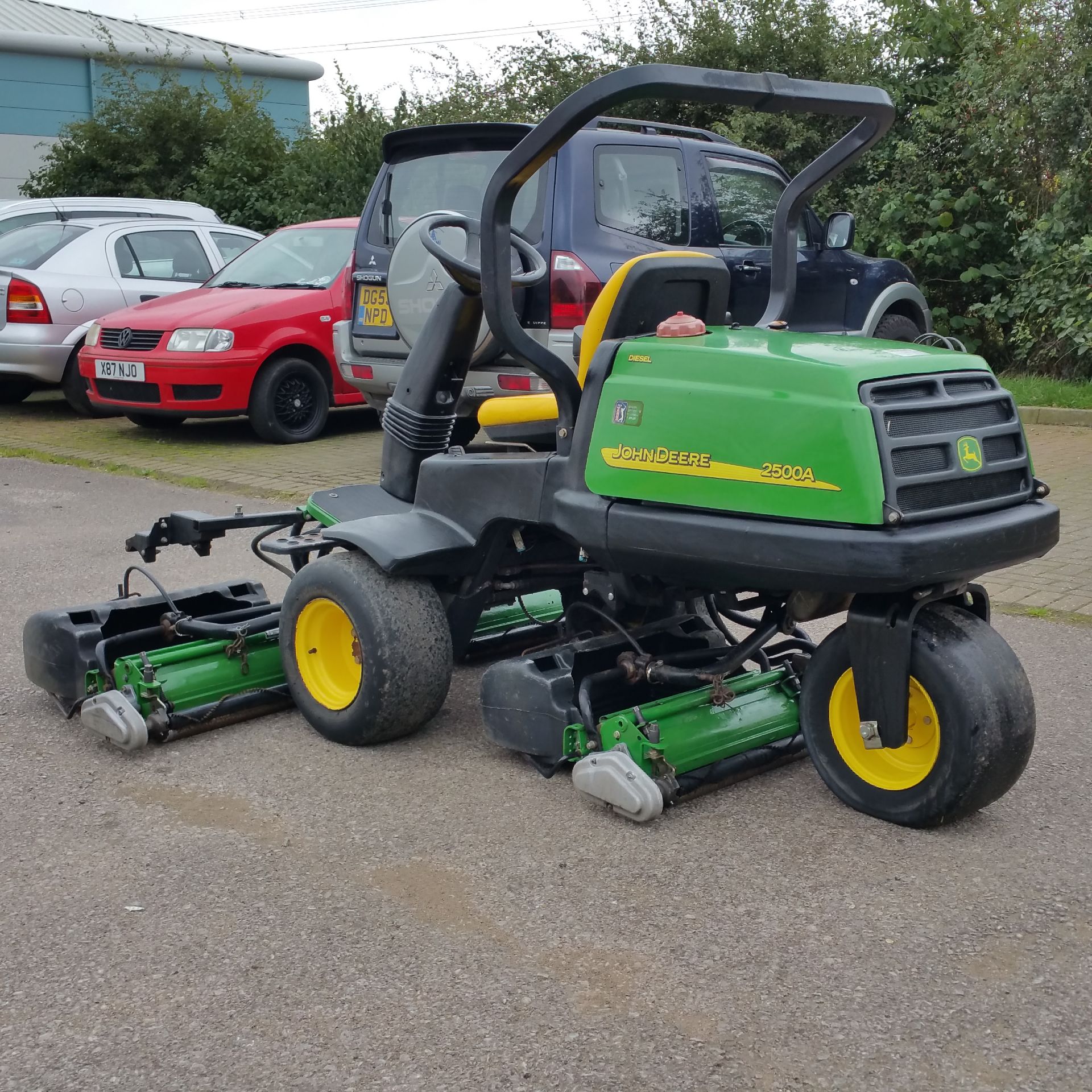 John Deere 2500A triple mower. 3 cylinder diesel. 2 wheel hydrostatic drive.Powered rollers.