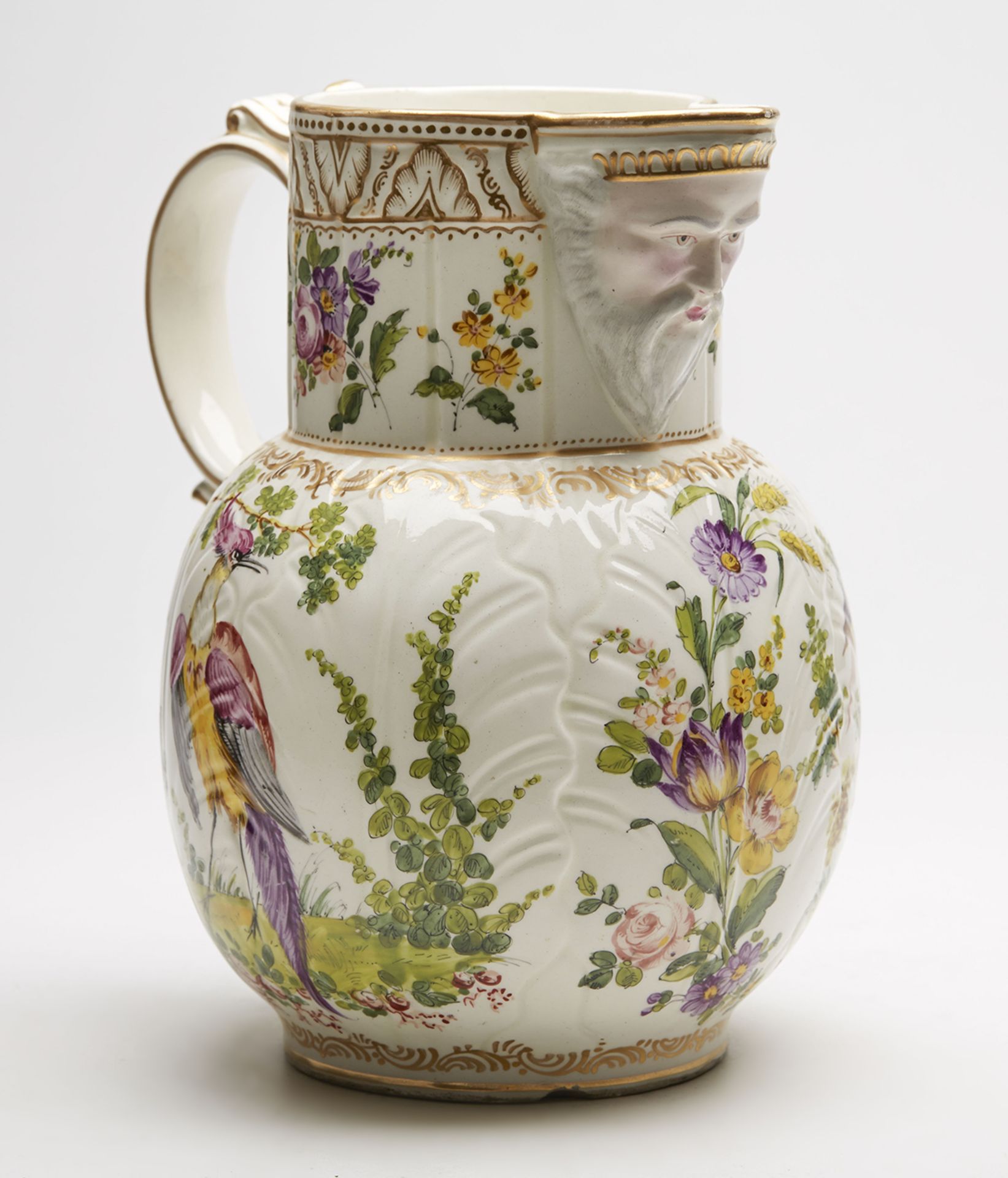 ANTIQUE CABBAGE LEAF MASK JUG WITH EXOTIC BIRDS 18/19TH C.