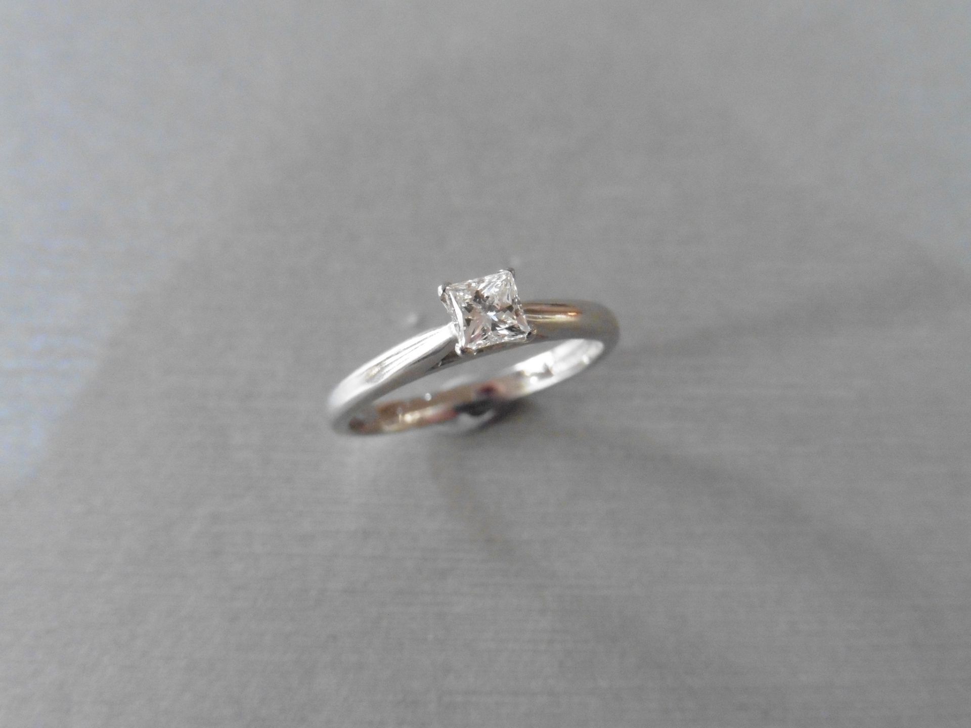0.32ct diamond solitaire ring set with a princess cut diamond of I colour and VS clarity. 18Ct white