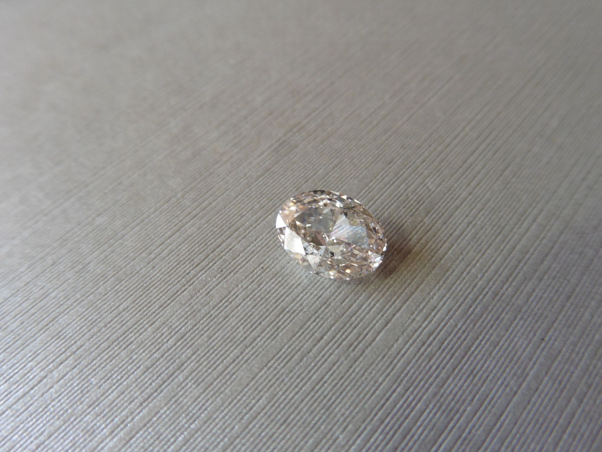 2.21ct loose oval cut diamond. M colour, VS2 clarity. 9.02 x 6.79 x 4.35mm. GIA cert – 6212135741. - Image 5 of 8