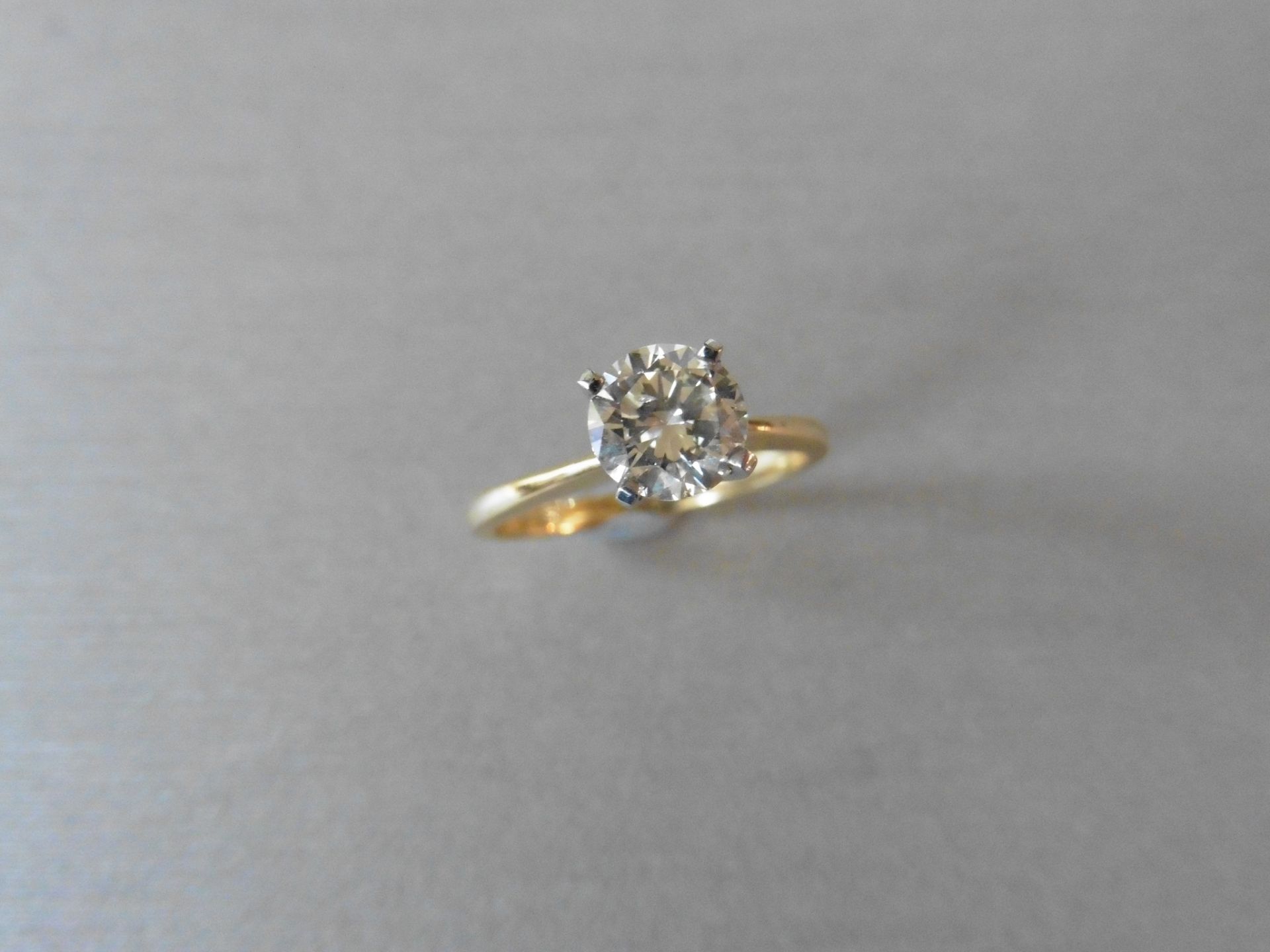 1.00ct diamond solitaire ring set with abrilliant cut diamond, J colour Si1/2 clarity. Set in a high