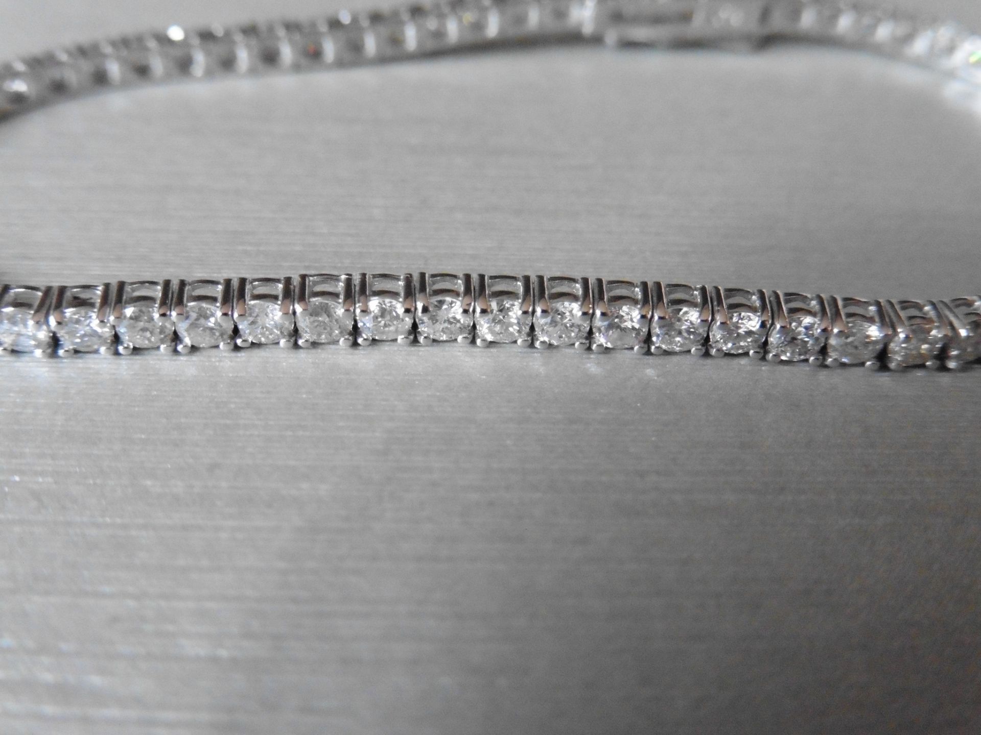 6.60ct Diamond tennis bracelet set with brilliant cut diamonds of H/I colour, si3 clarity. All set