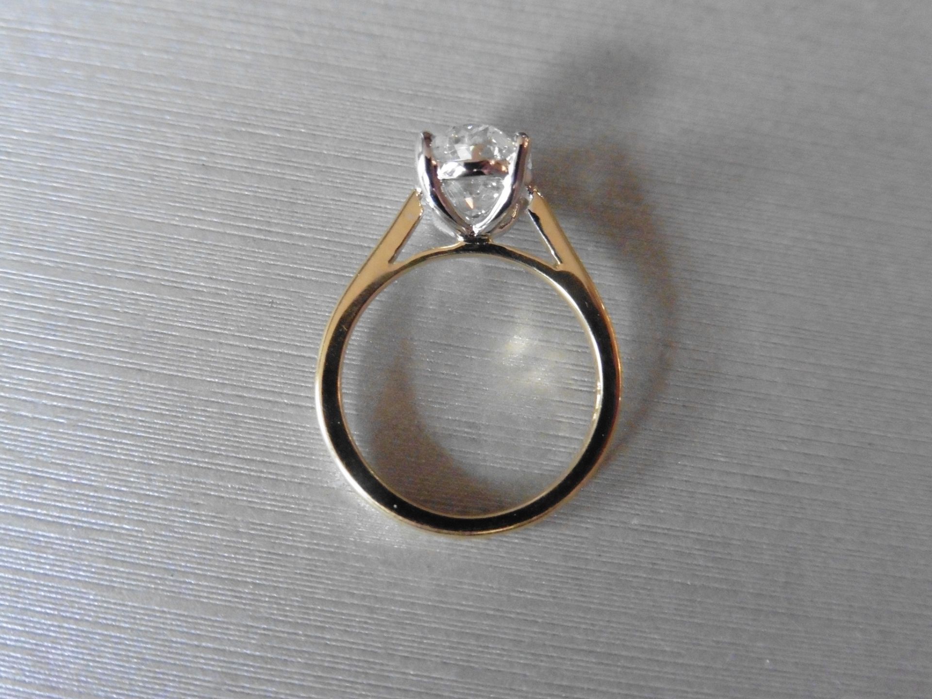 3.01ct oval cut diamond, H colour, Si2 clarity. 18Ct, 4 claw white gold setting with a yellow gold - Image 2 of 4