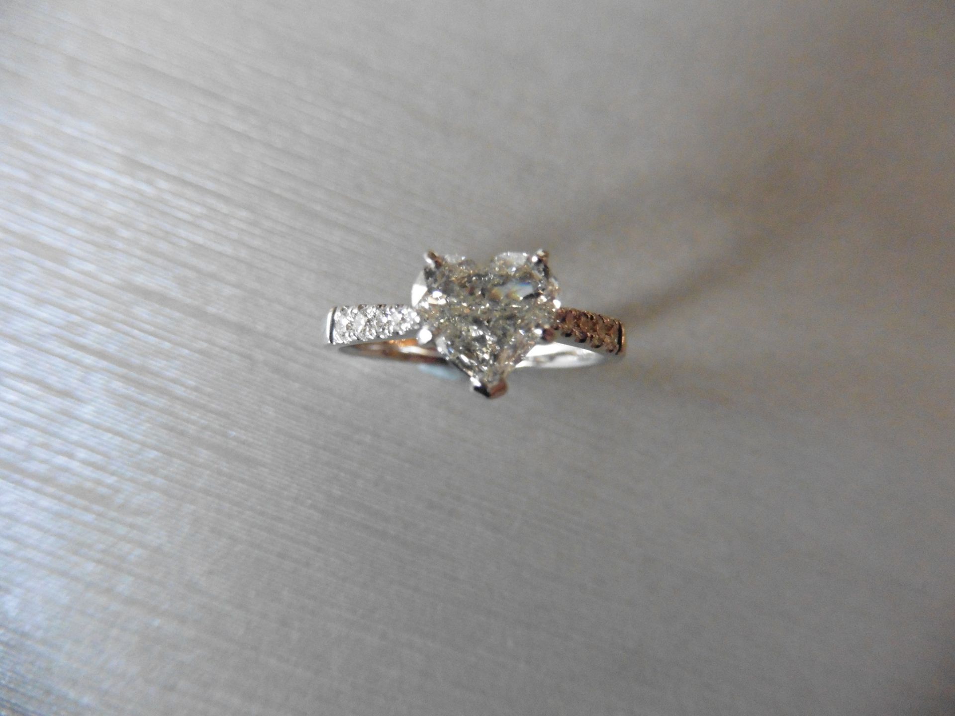 0.70ct heart shaped diamond solitaire ring J colour. The shoulders are set with 0.15ct small - Image 2 of 4