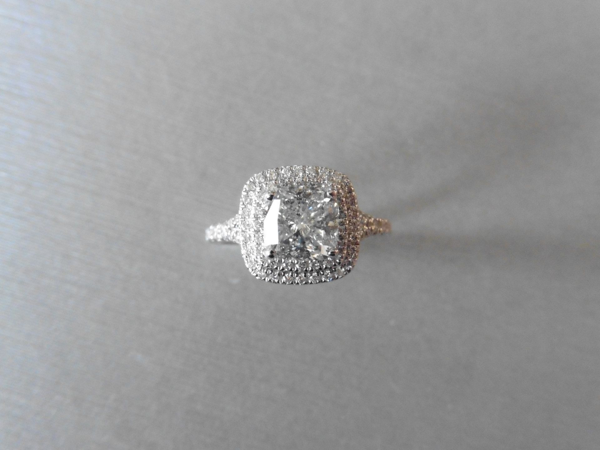 1.81ct diamond set solitaire ring with a cushion cut diamond in the centre, F colour, I1 clarity.