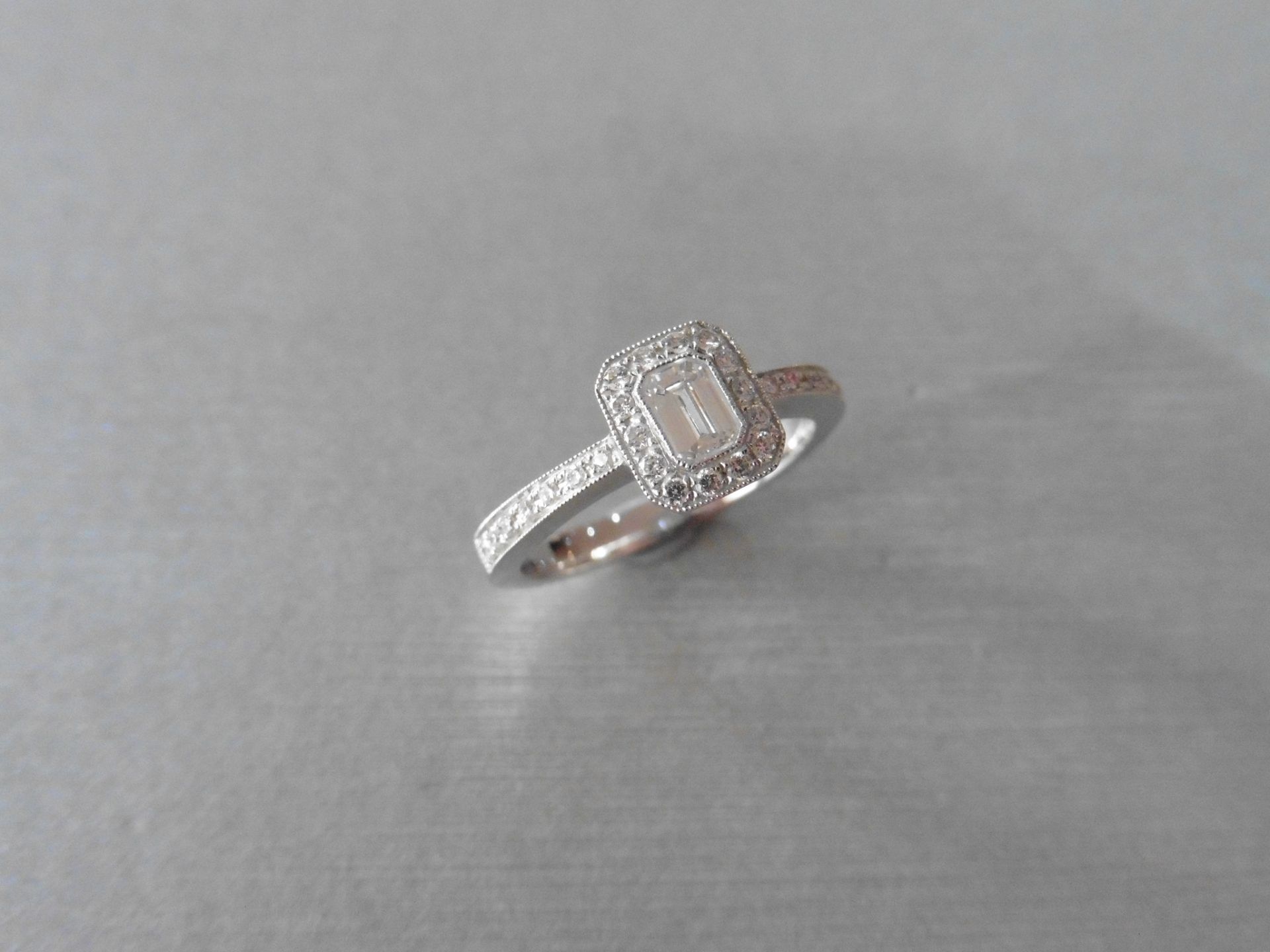 0.31ct 18ct white gold diamond set ring is set with a emerald cut diamond of VS clarity. This is set - Image 2 of 4