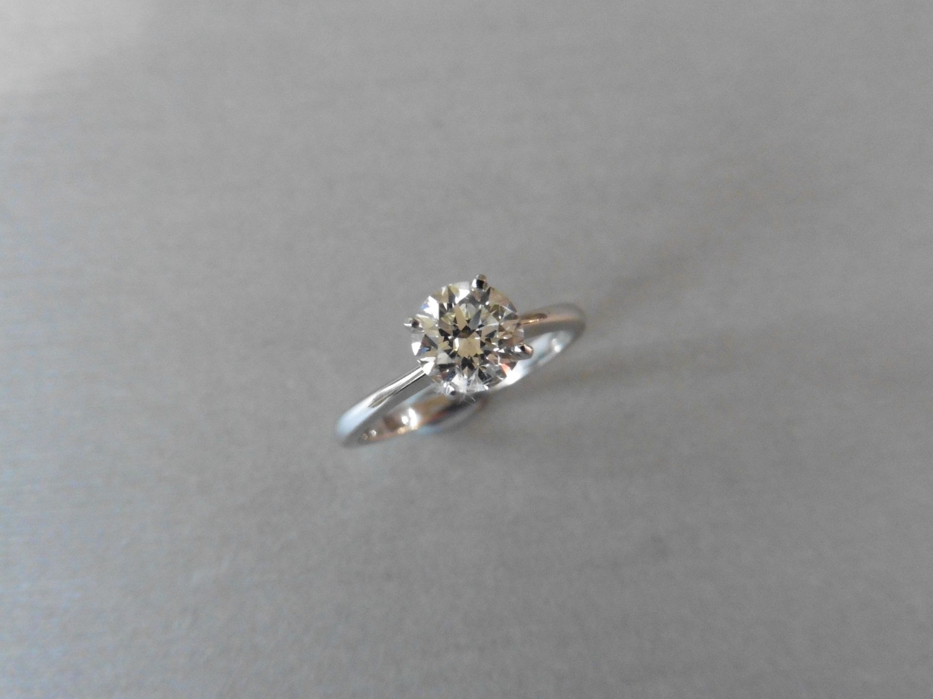 1.00ct diamond solitaire ring set with abrilliant cut diamond, J colour Si1/2 clarity. Set in a high