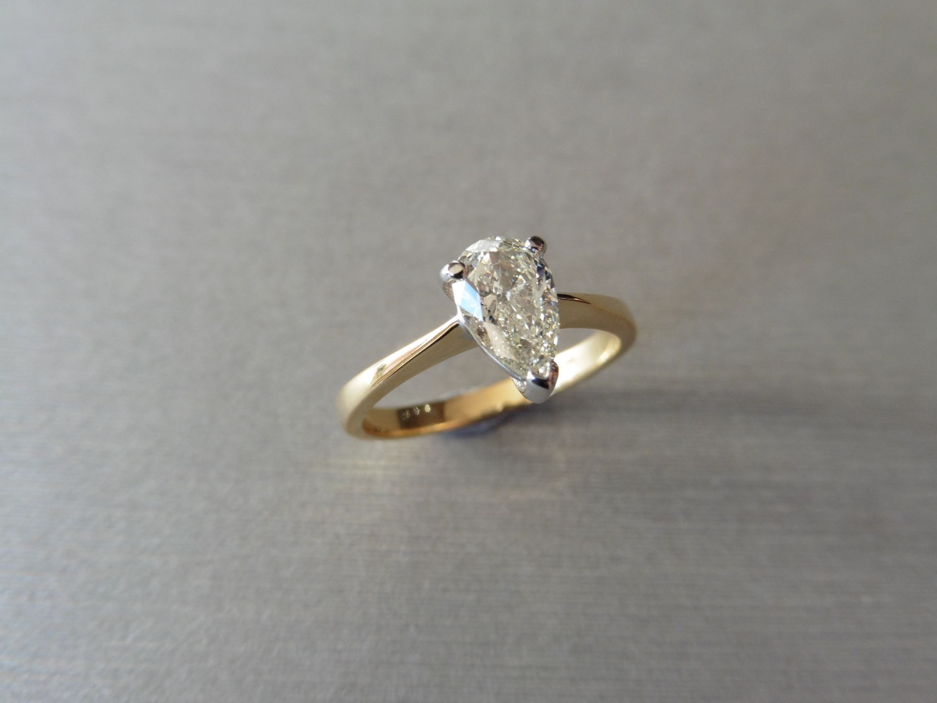 0.70ct pear shaped diamond solitaire ring. J/K colour VS clarity. 3 claw setting in white gold