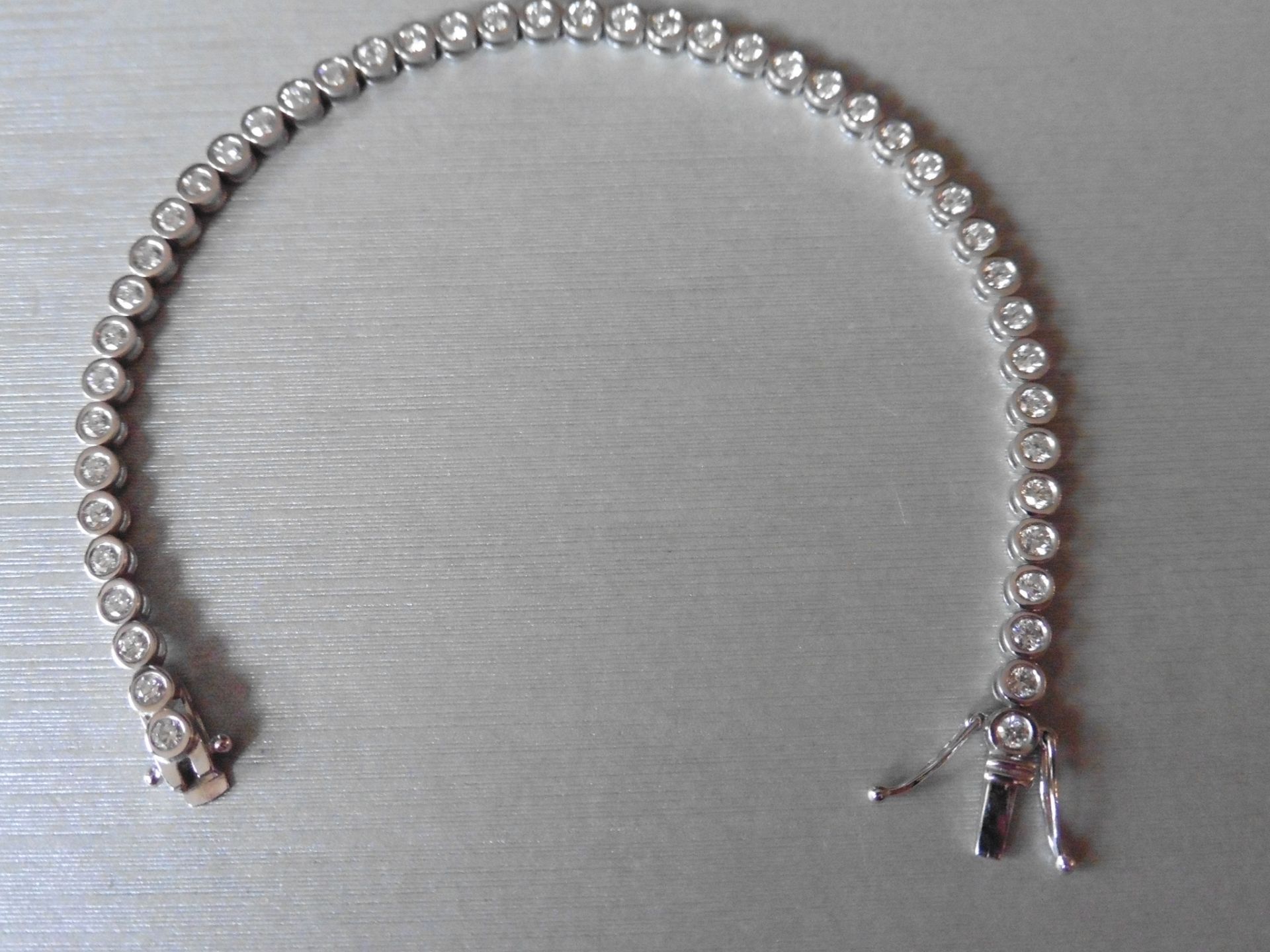 3.50ct tennis style bracelet set with brilliant cut diamonds. I colour, Si3 clarity. 18Ct white - Image 3 of 3