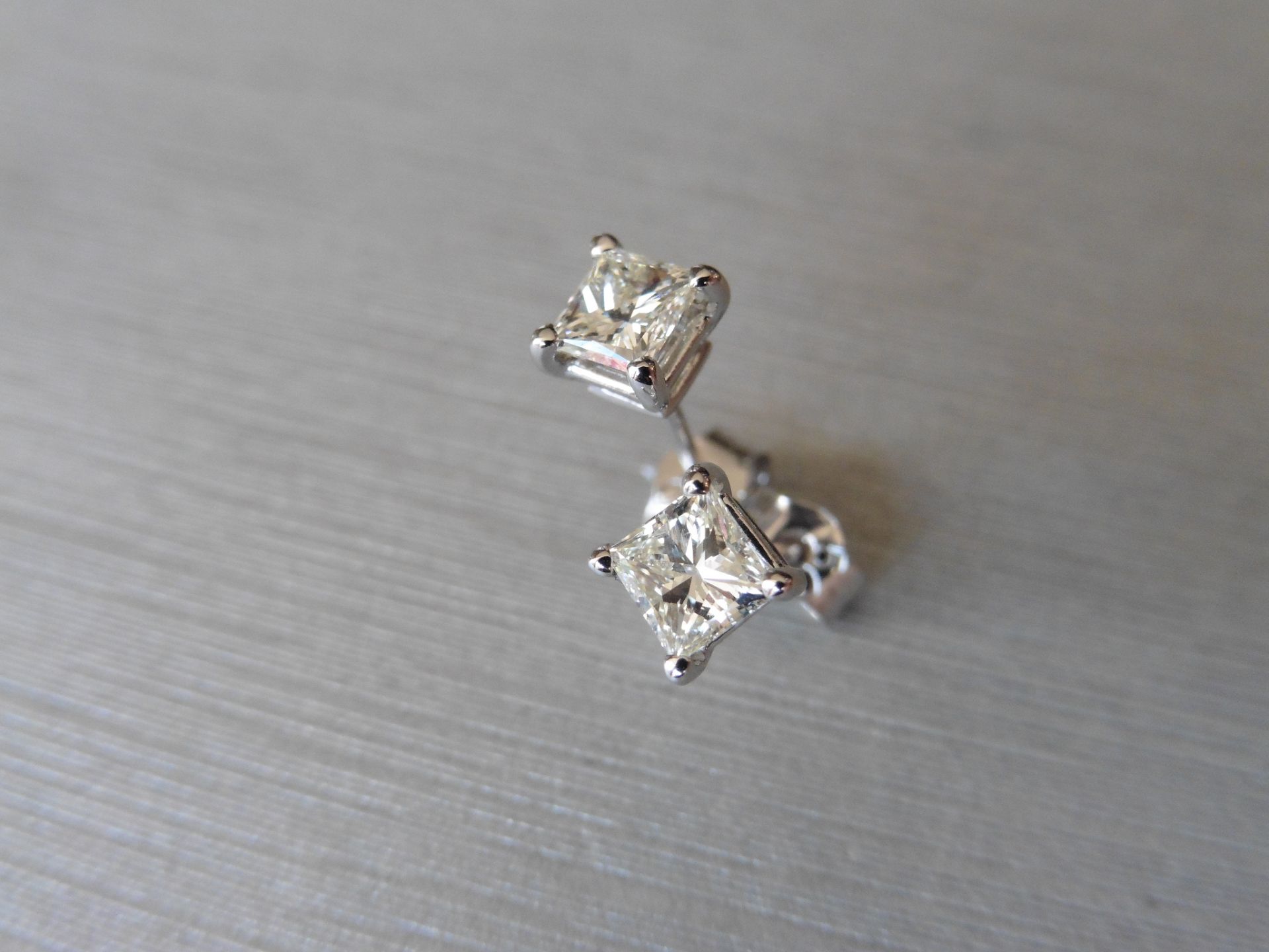0.80ct diamond solitaire earrings. Each set with a princess cut diamond, I colour VS clarity. 4 claw - Image 3 of 3