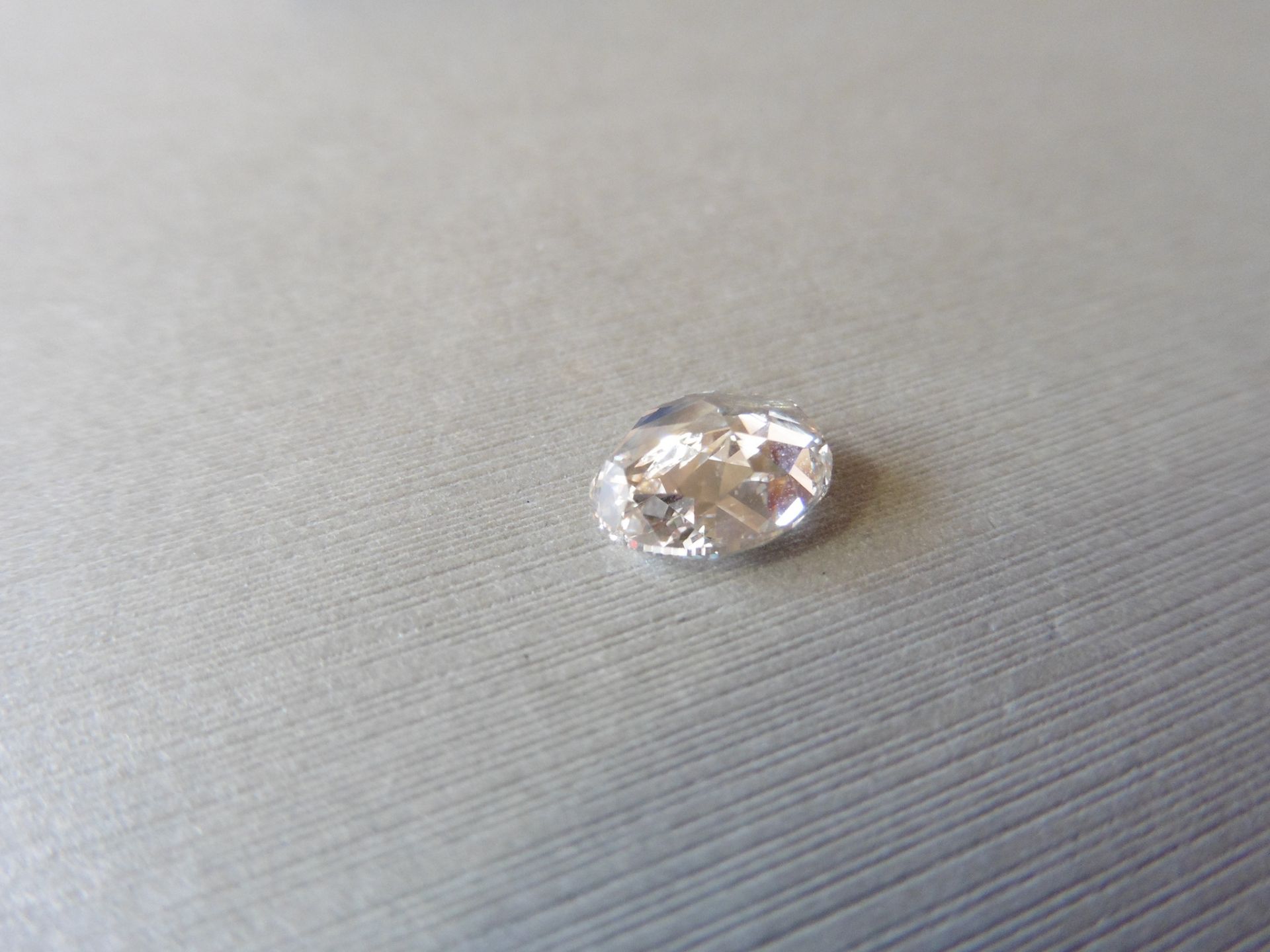 2.21ct loose oval cut diamond. M colour, VS2 clarity. 9.02 x 6.79 x 4.35mm. GIA cert – 6212135741. - Image 4 of 8