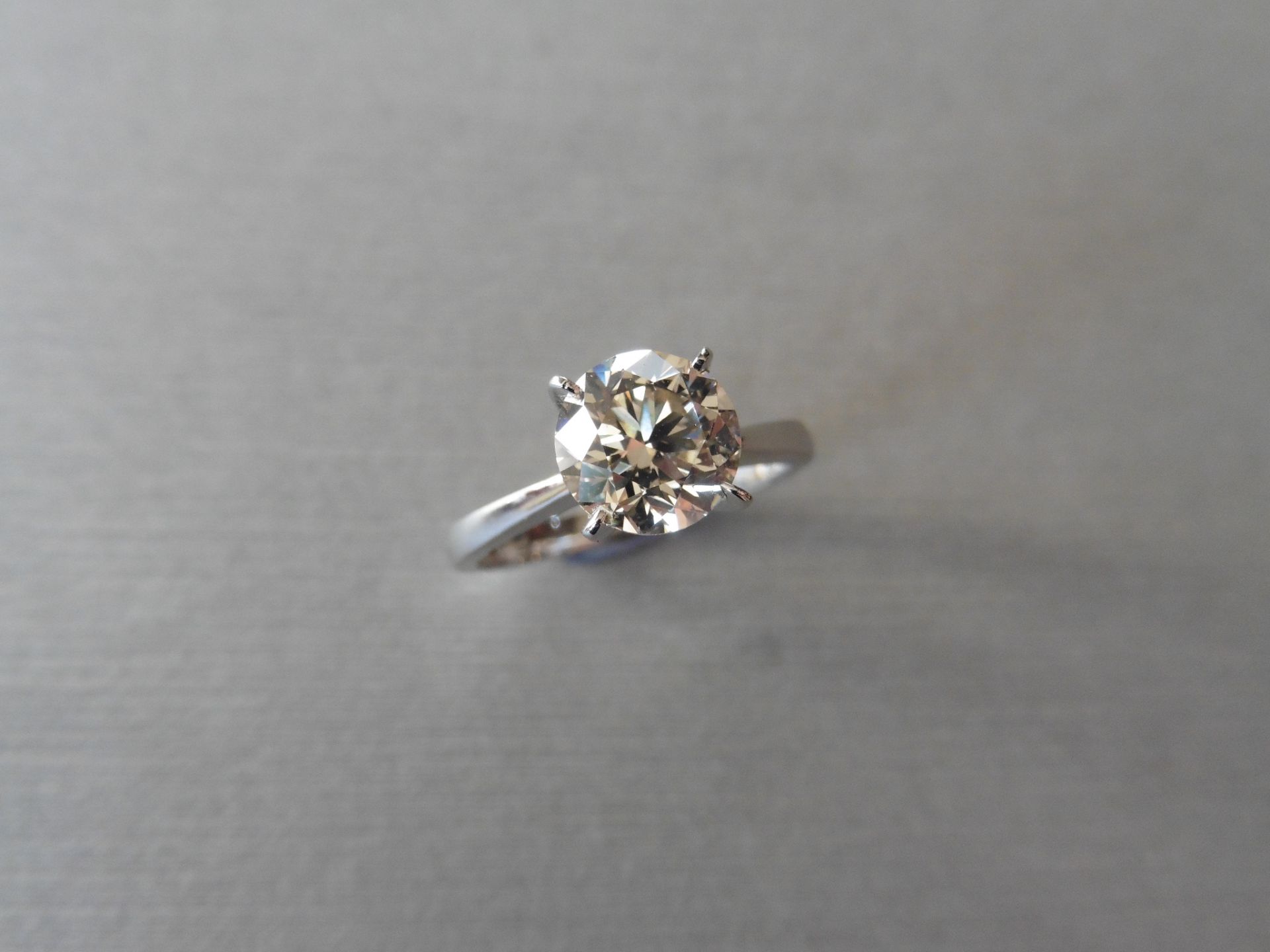 1.63ct brilliant cut diamond solitaire ring. K Colour and VS1 clarity. Set in a high 4 claw