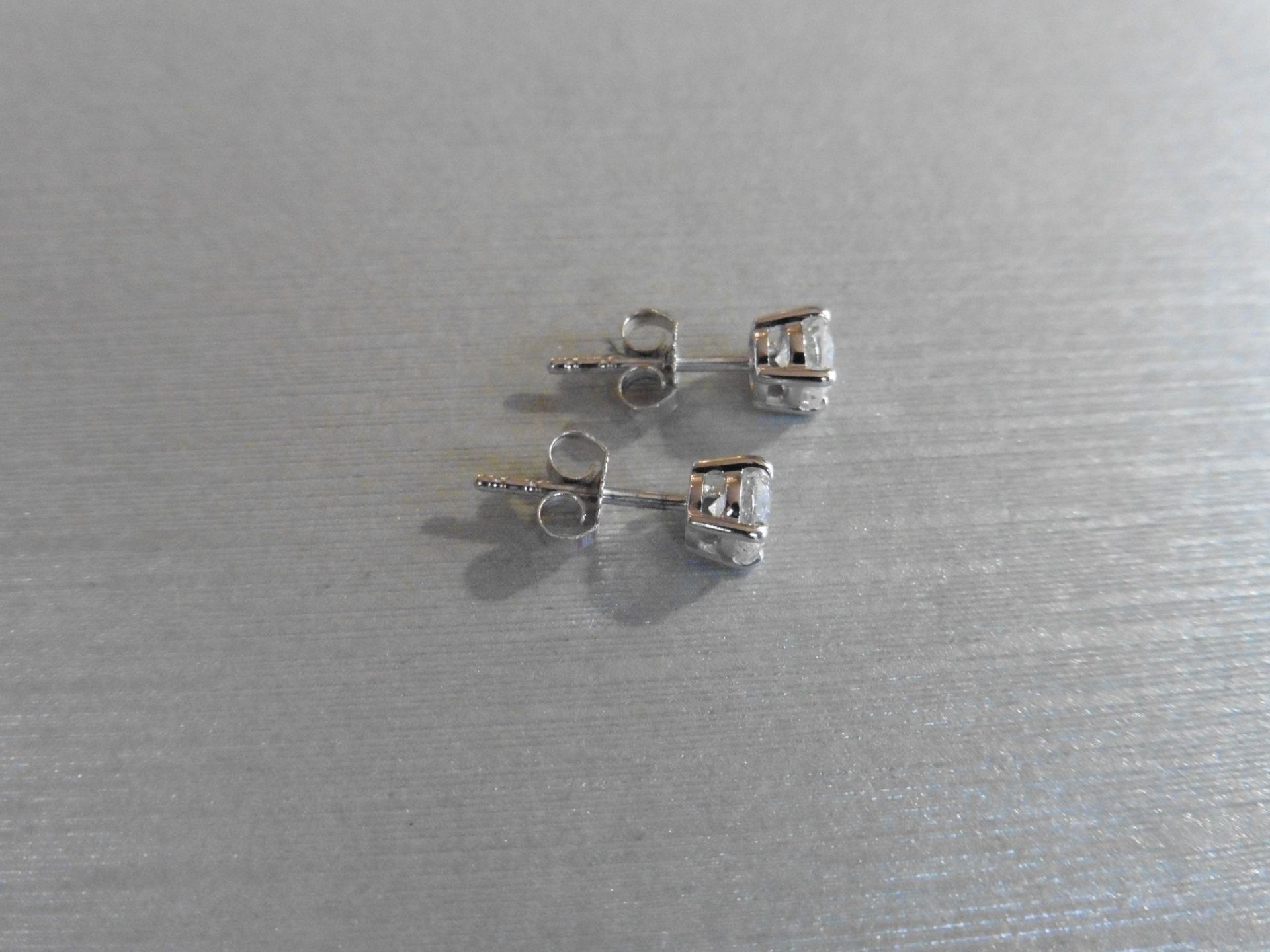 1.00ct Solitaire diamond stud earrings set with brilliant cut diamonds, SI3 clarity and H/I - Image 2 of 2