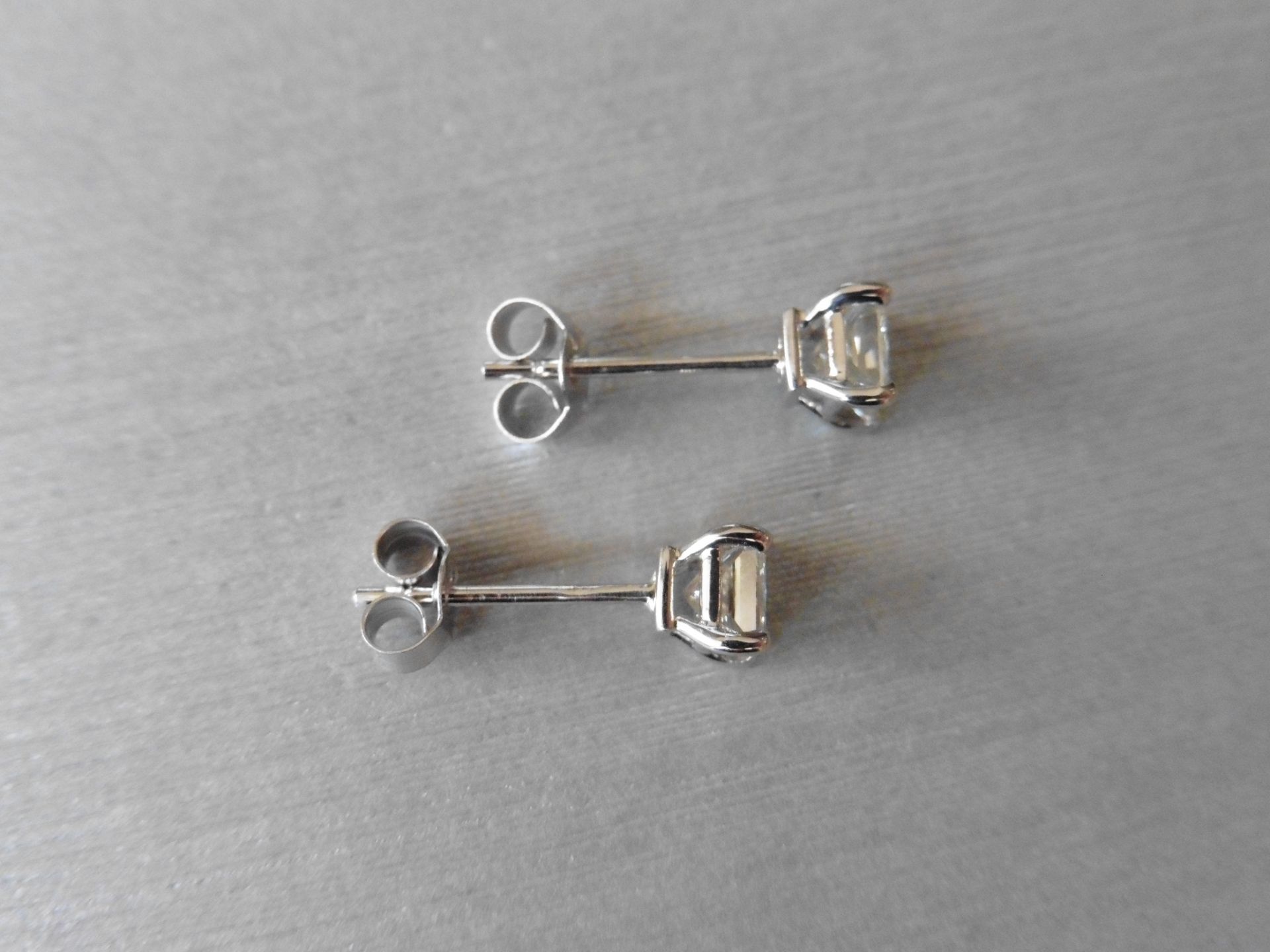 0.80ct diamond solitaire earrings. Each set with a princess cut diamond, I colour VS clarity. 4 claw - Image 2 of 3