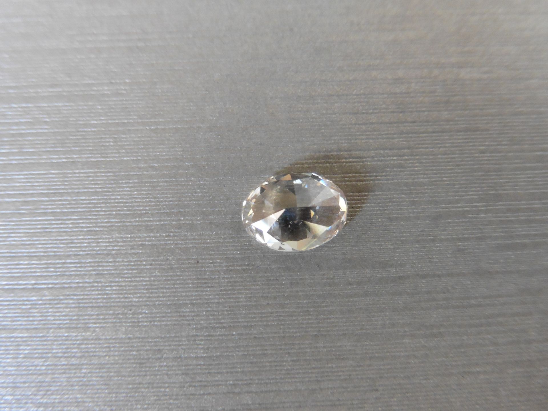 2.21ct loose oval cut diamond. M colour, VS2 clarity. 9.02 x 6.79 x 4.35mm. GIA cert – 6212135741. - Image 3 of 8