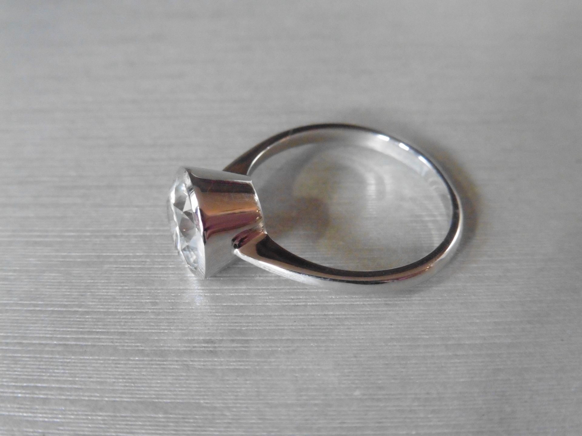 2.36ct brilliant cut diamond solitaire ring set in 18ct white gold rub over setting. K colour, Si2 - Image 3 of 4