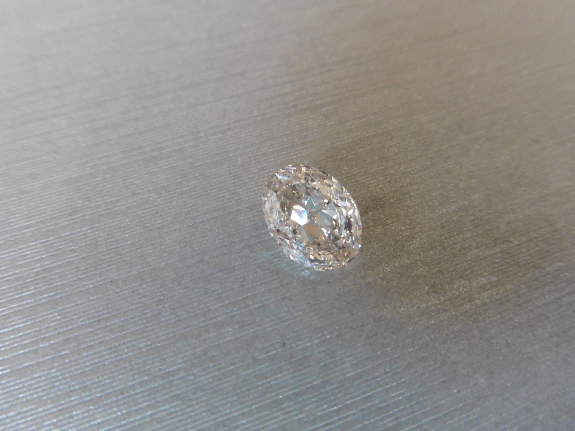 2.21ct loose oval cut diamond. M colour, VS2 clarity. 9.02 x 6.79 x 4.35mm. GIA cert – 6212135741.
