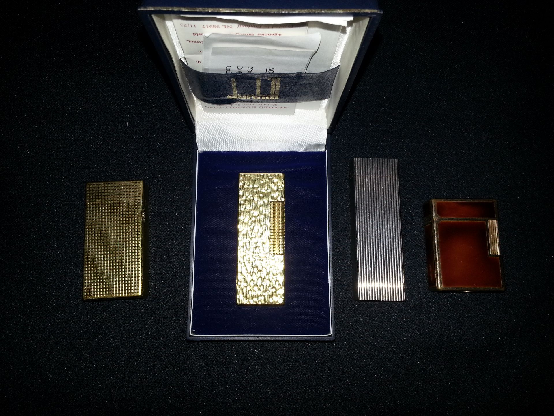 Collection of lighters to include two 18ct GP Dunhill, S.T.Dupont and a solid silver one.
