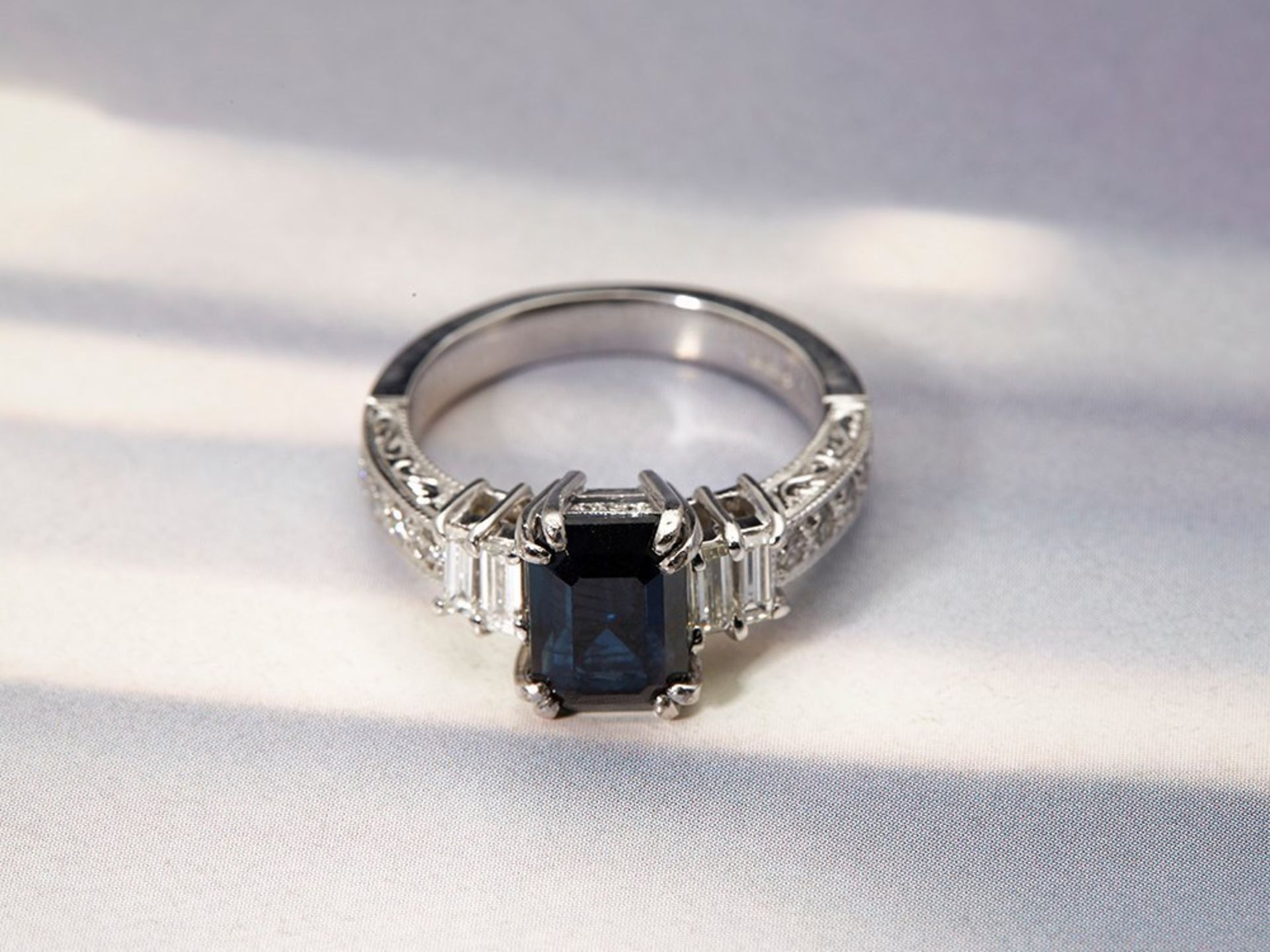 Platinum 3.03ct Emerald Cut Sapphire & 0.88ct Diamond Ring
