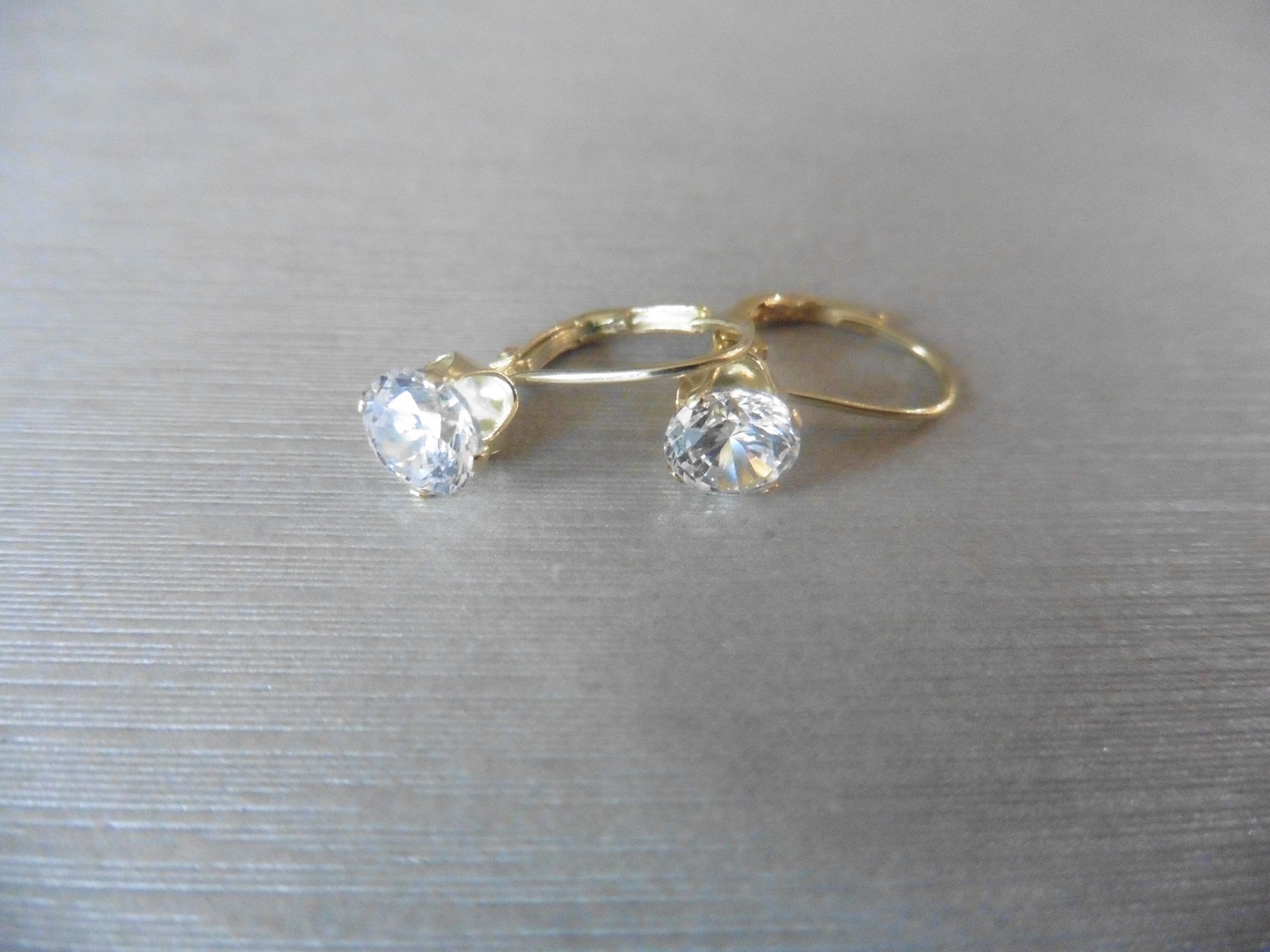 0.80ct diamond hinged style earrings each set with a brilliant cut diamond, I colour,Si2 clarity. - Bild 2 aus 3