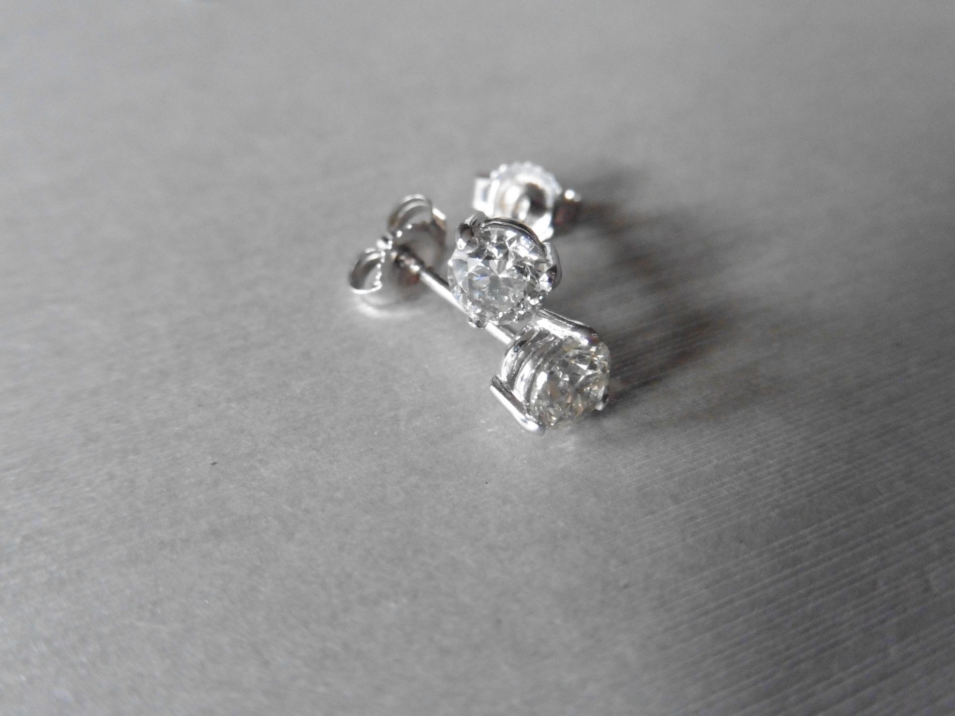 1.00ct Solitaire diamond stud earrings set with brilliant cut diamonds, SI2 clarity and I colour.