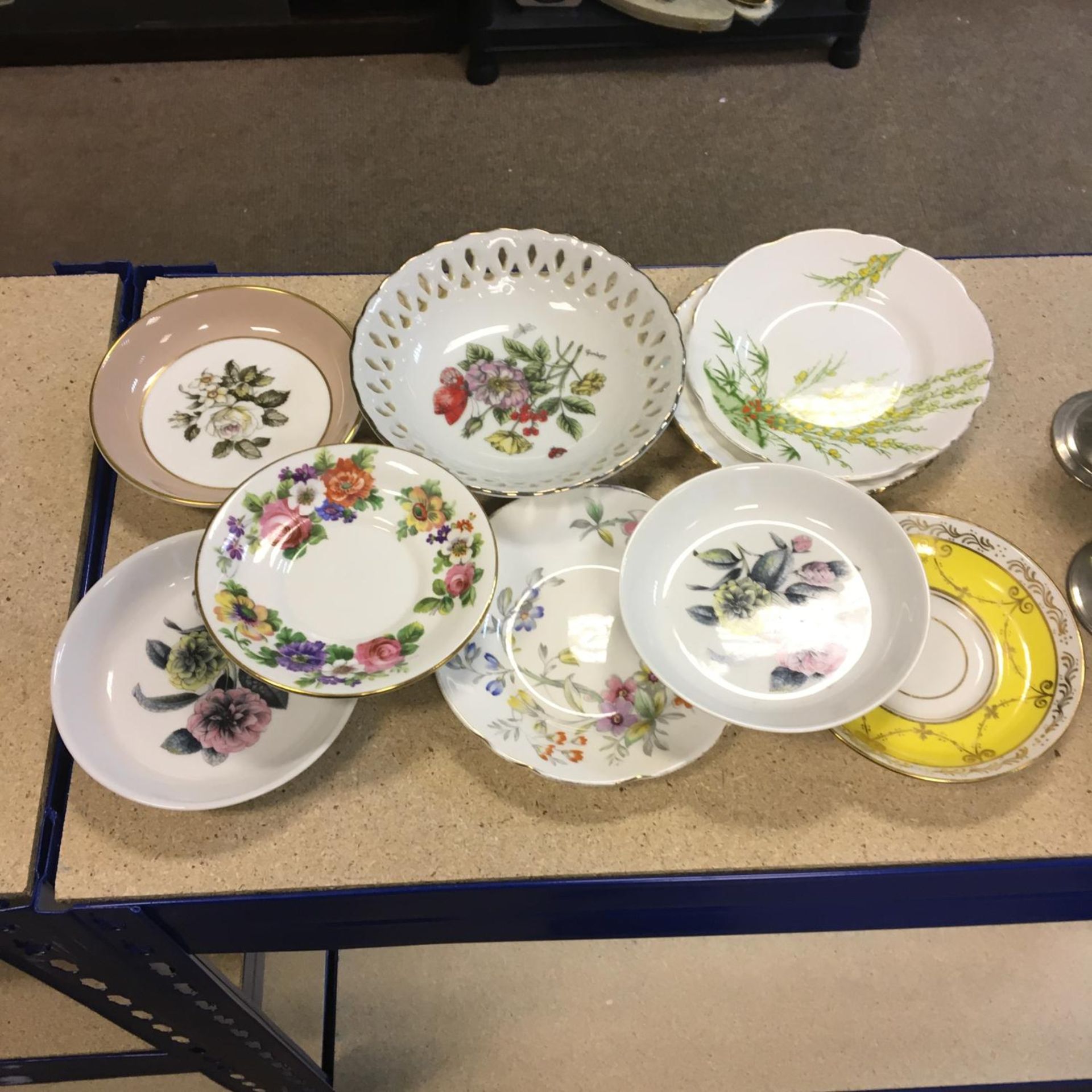Group of nine fine bone china butter pats / saucers - all in good condition