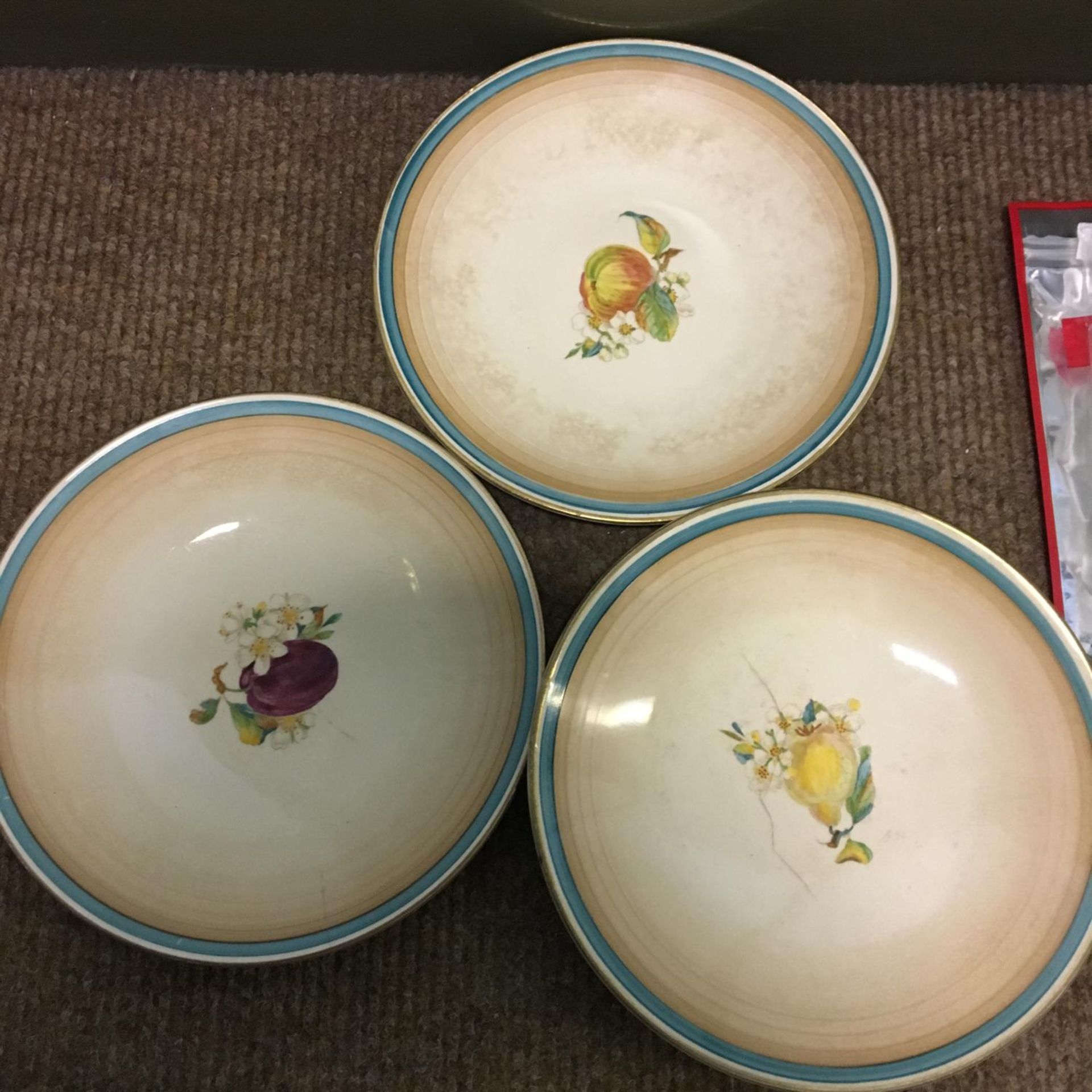 Set of Three Plates Painted with Fruits