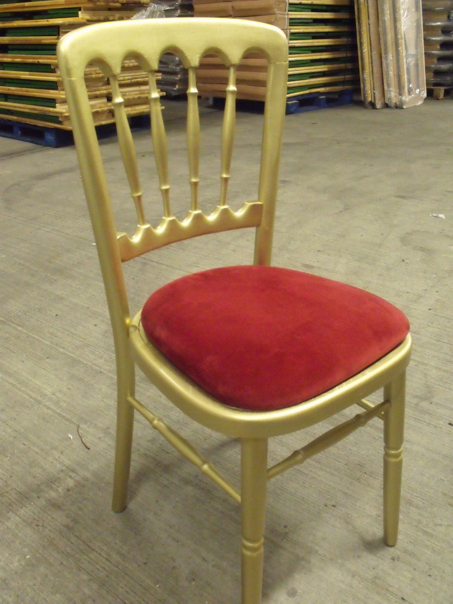 59 x cheltenham style stacking wooden banqueting chairs recently resprayed burgundy Velcro seat pad