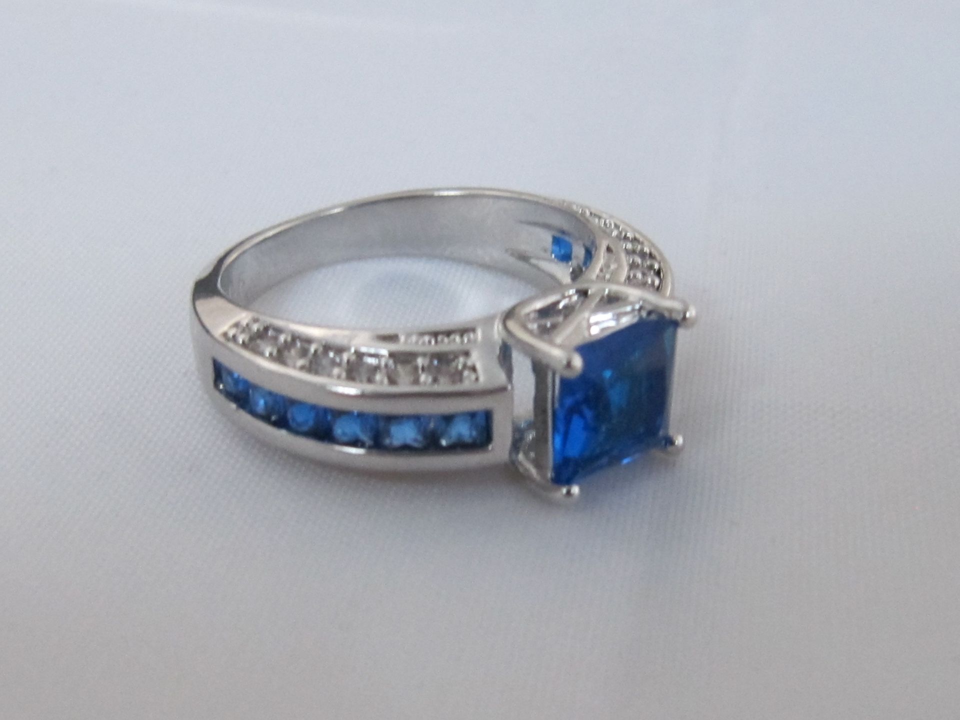 10k White Gold Filled with Blue Sapphires. Size S.