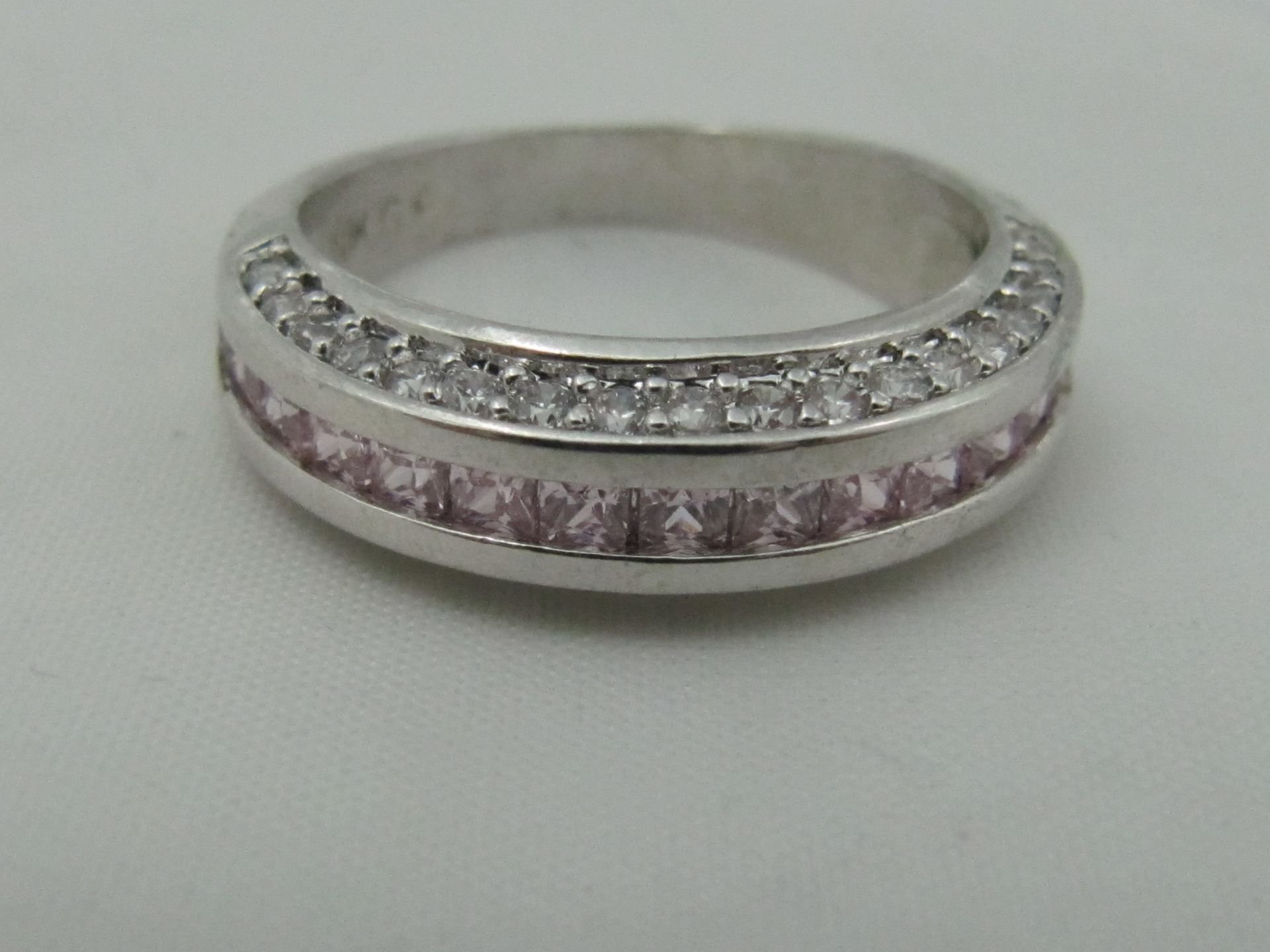 10k White Gold Filled with Pink Sapphires. Size Q.