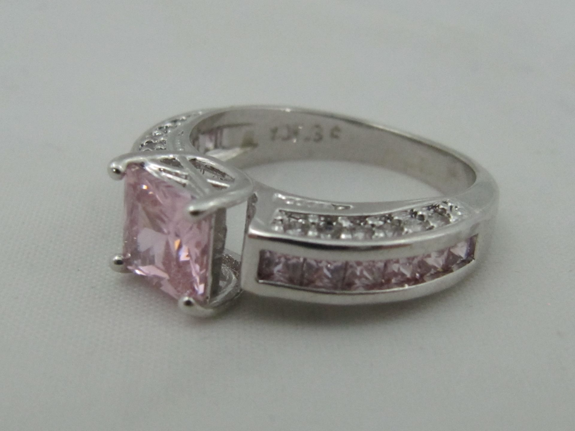 10k White Gold Filled with Pink Sapphires. Size O.